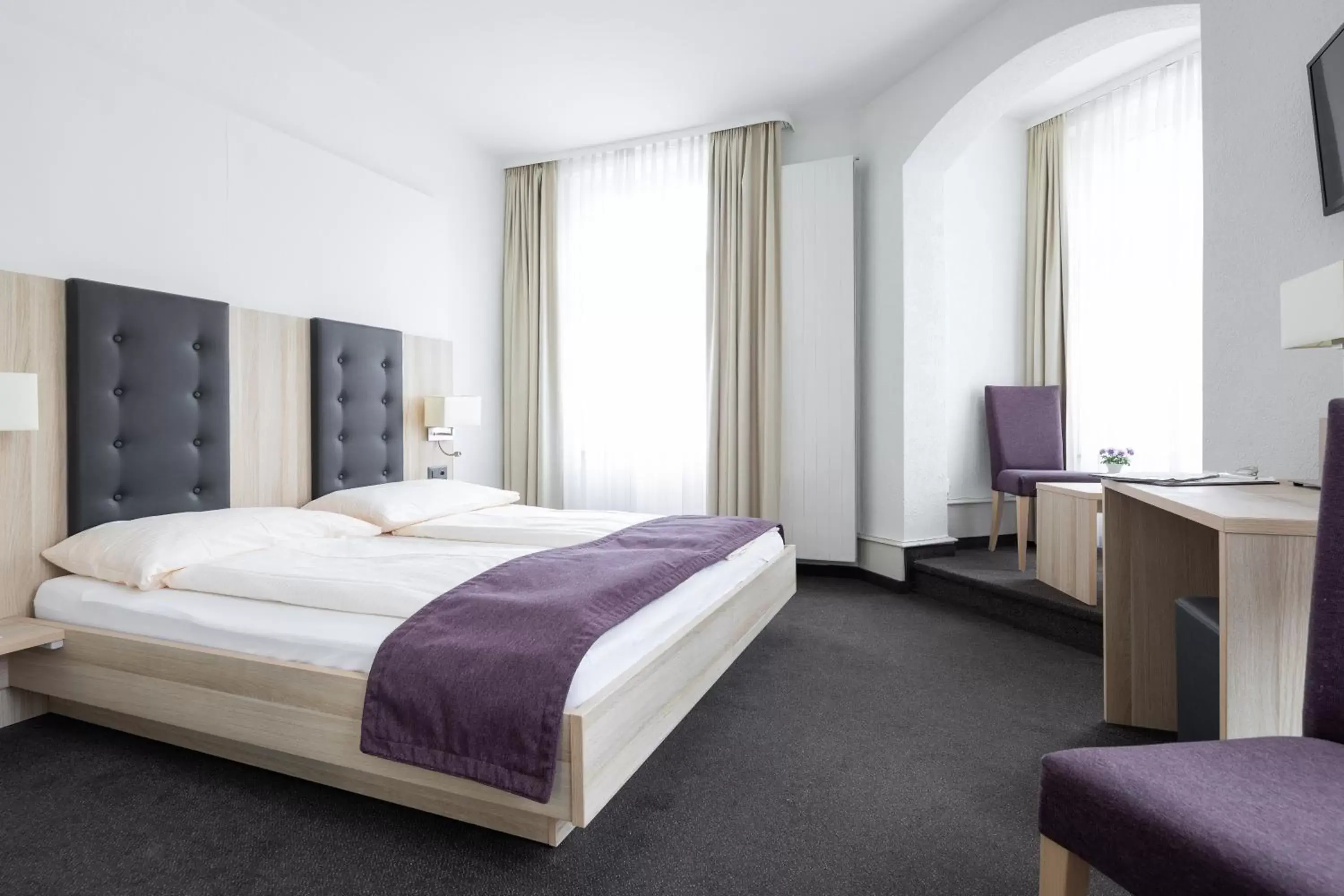 Photo of the whole room, Bed in Hotel Lötschberg