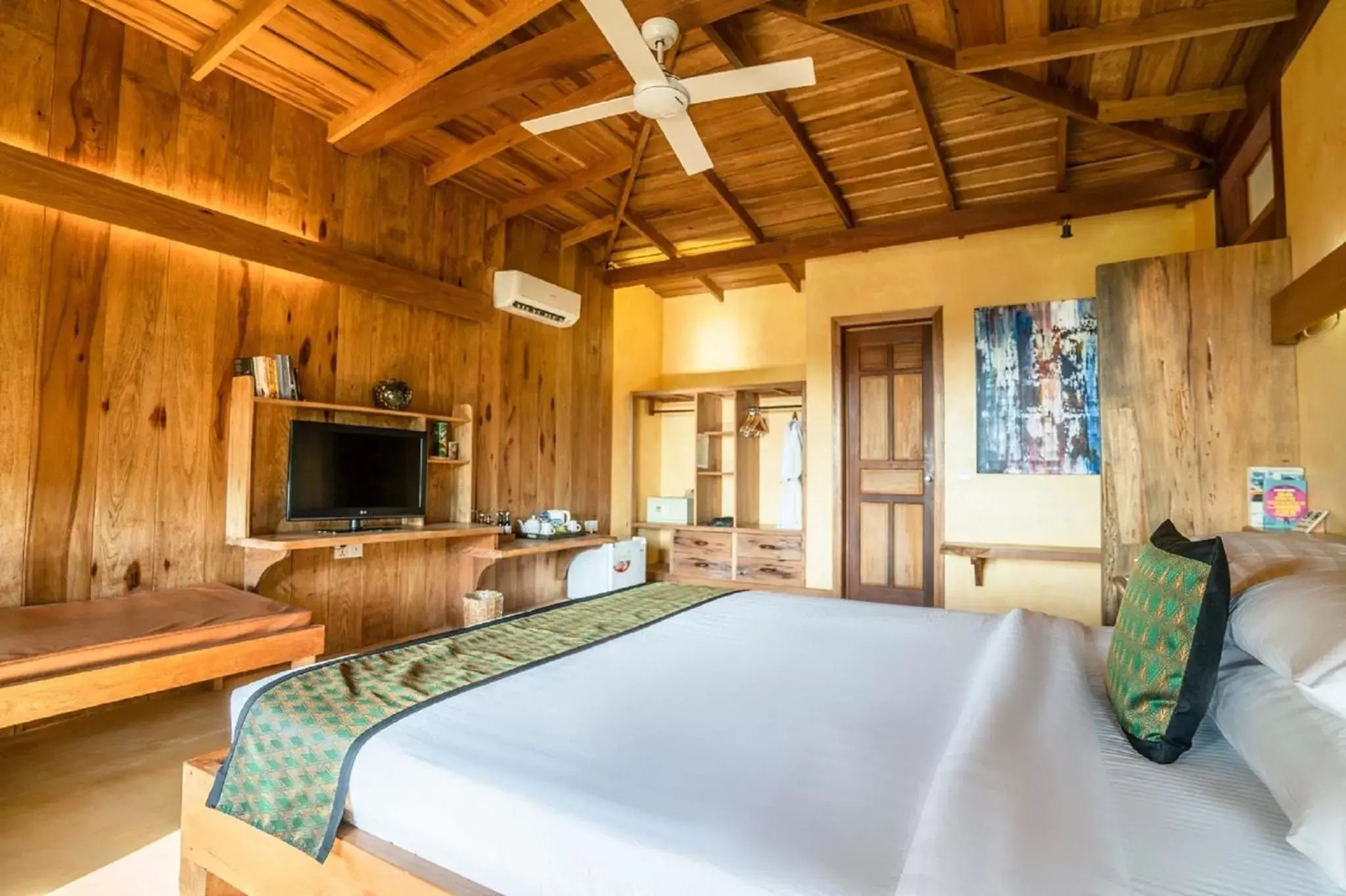 Bedroom, TV/Entertainment Center in Veranda Natural Resort