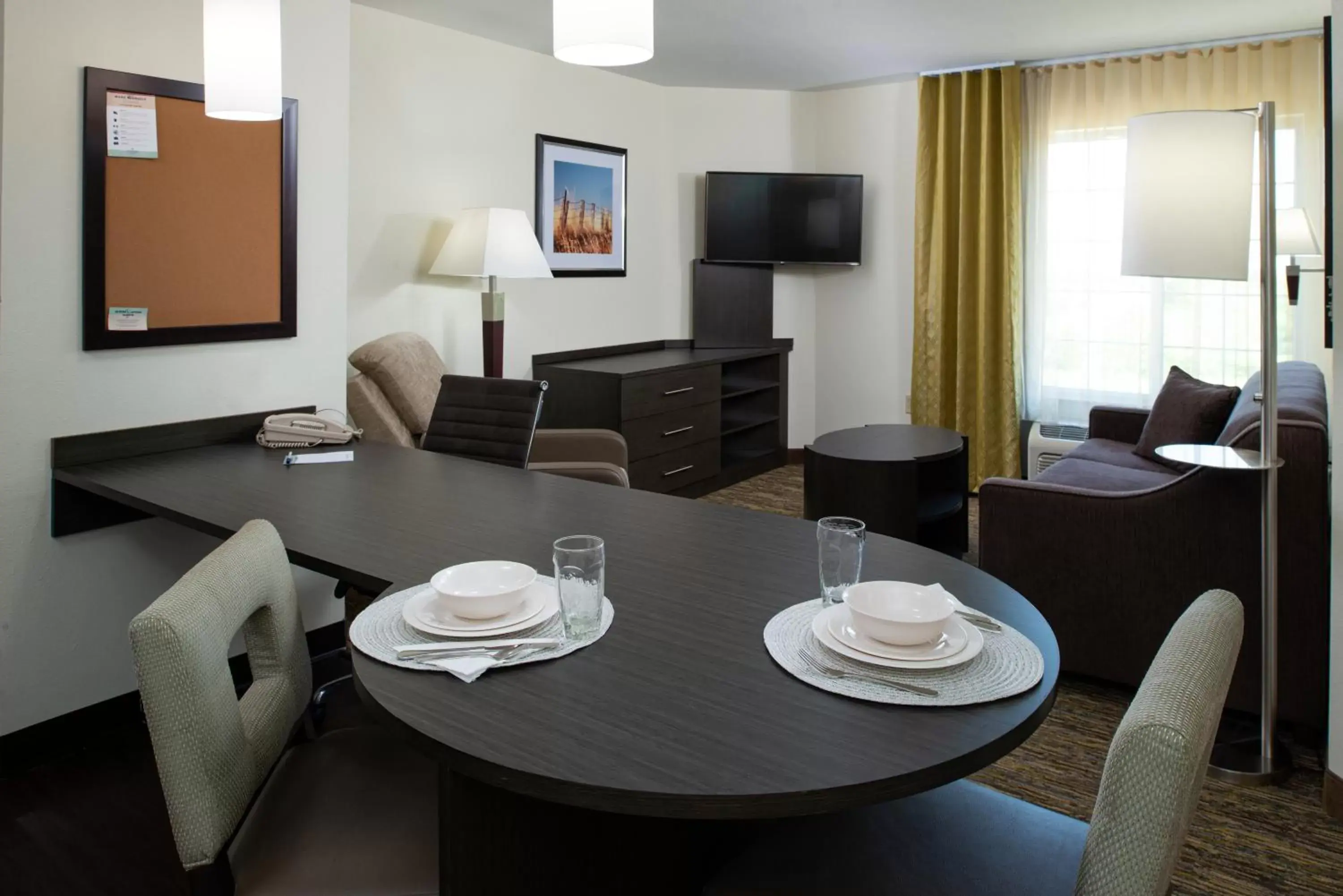 Bedroom, Restaurant/Places to Eat in Candlewood Suites Olathe, an IHG Hotel