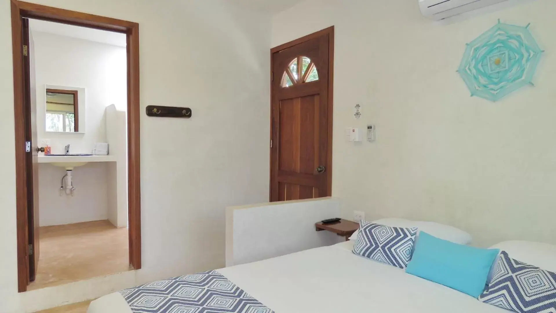 Bed in Hotel & Suites Oasis Bacalar