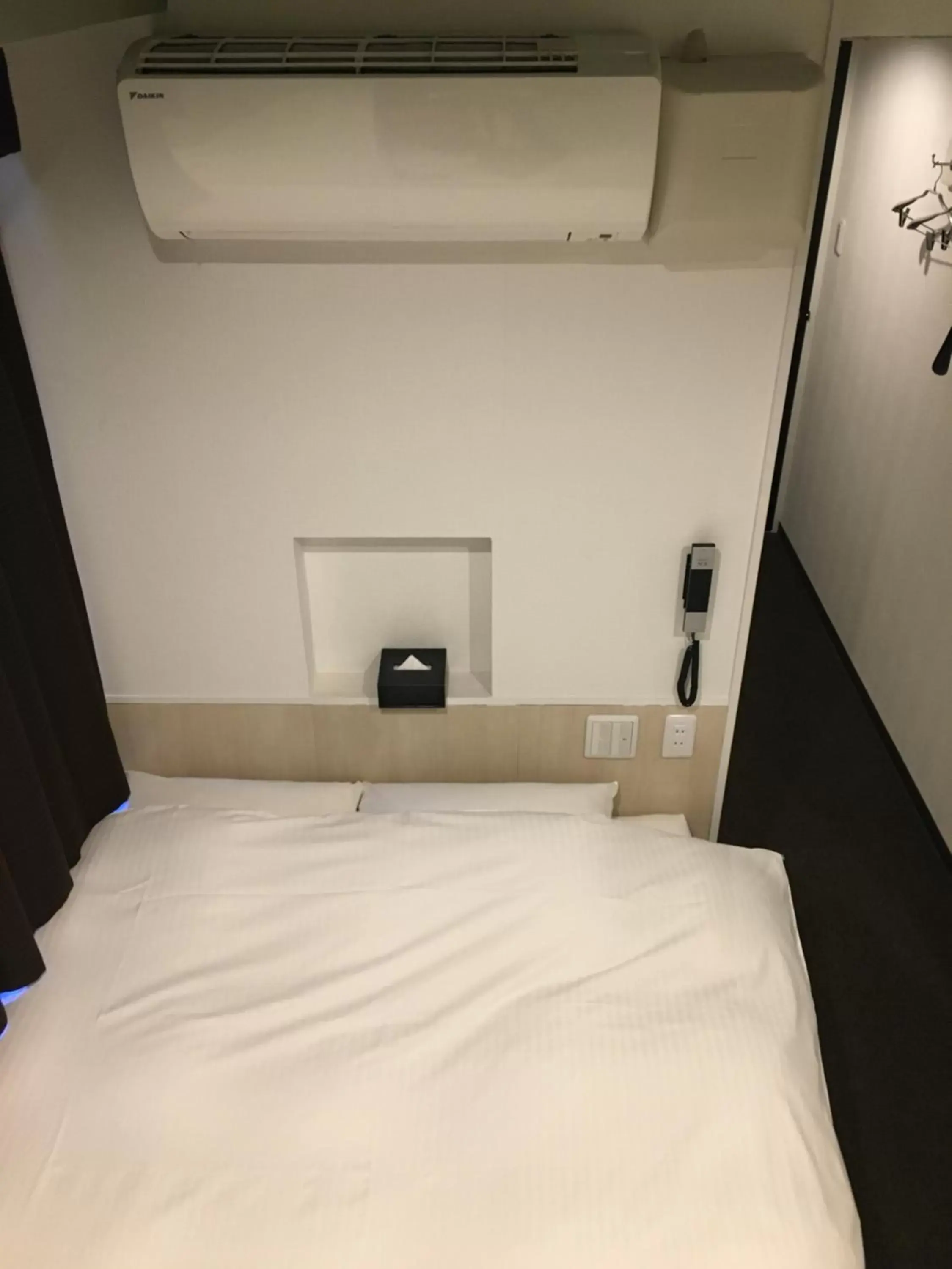 Bed in Nagoyaeki Access Hotel