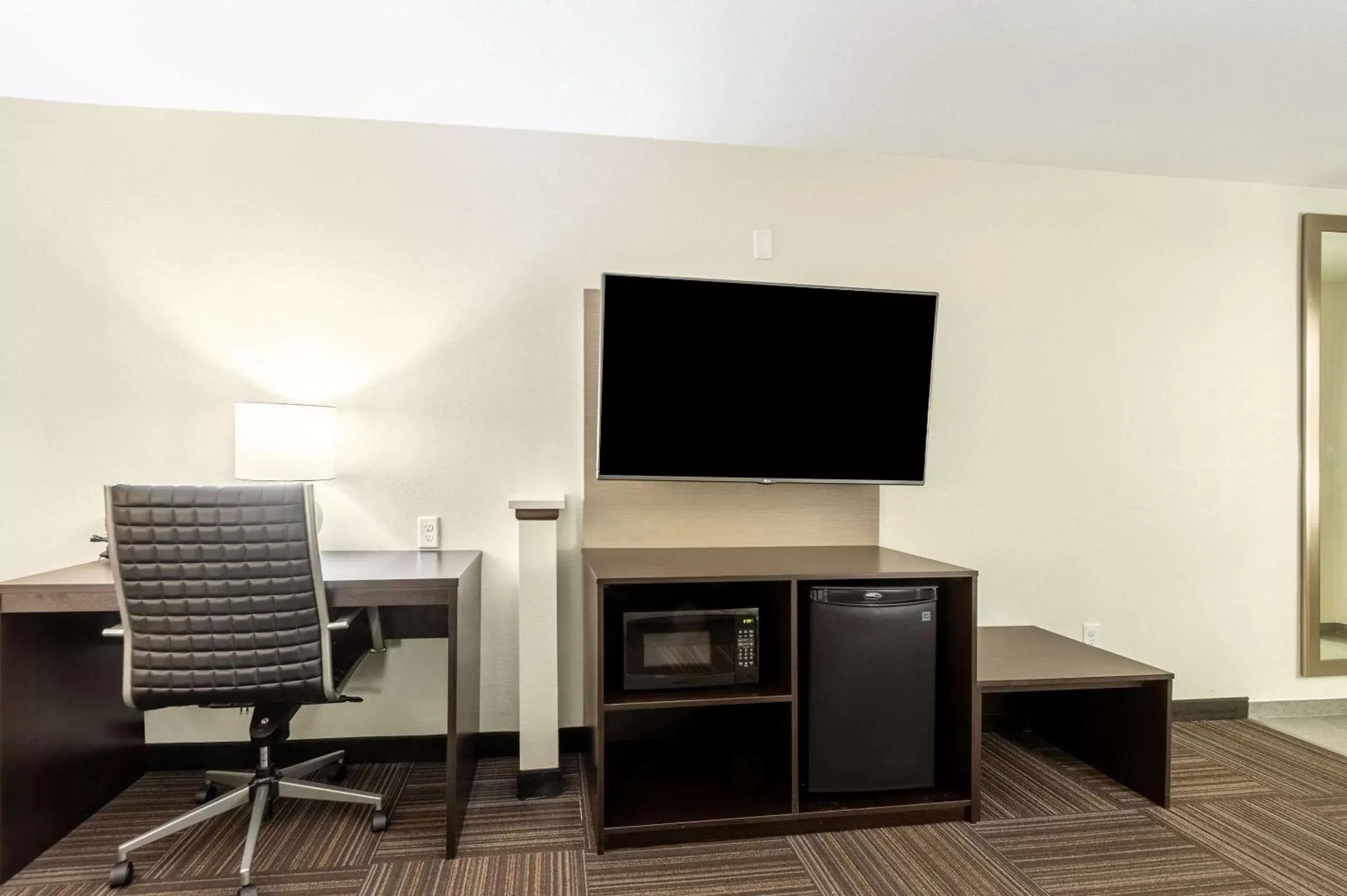 Photo of the whole room, TV/Entertainment Center in Sleep Inn & Suites