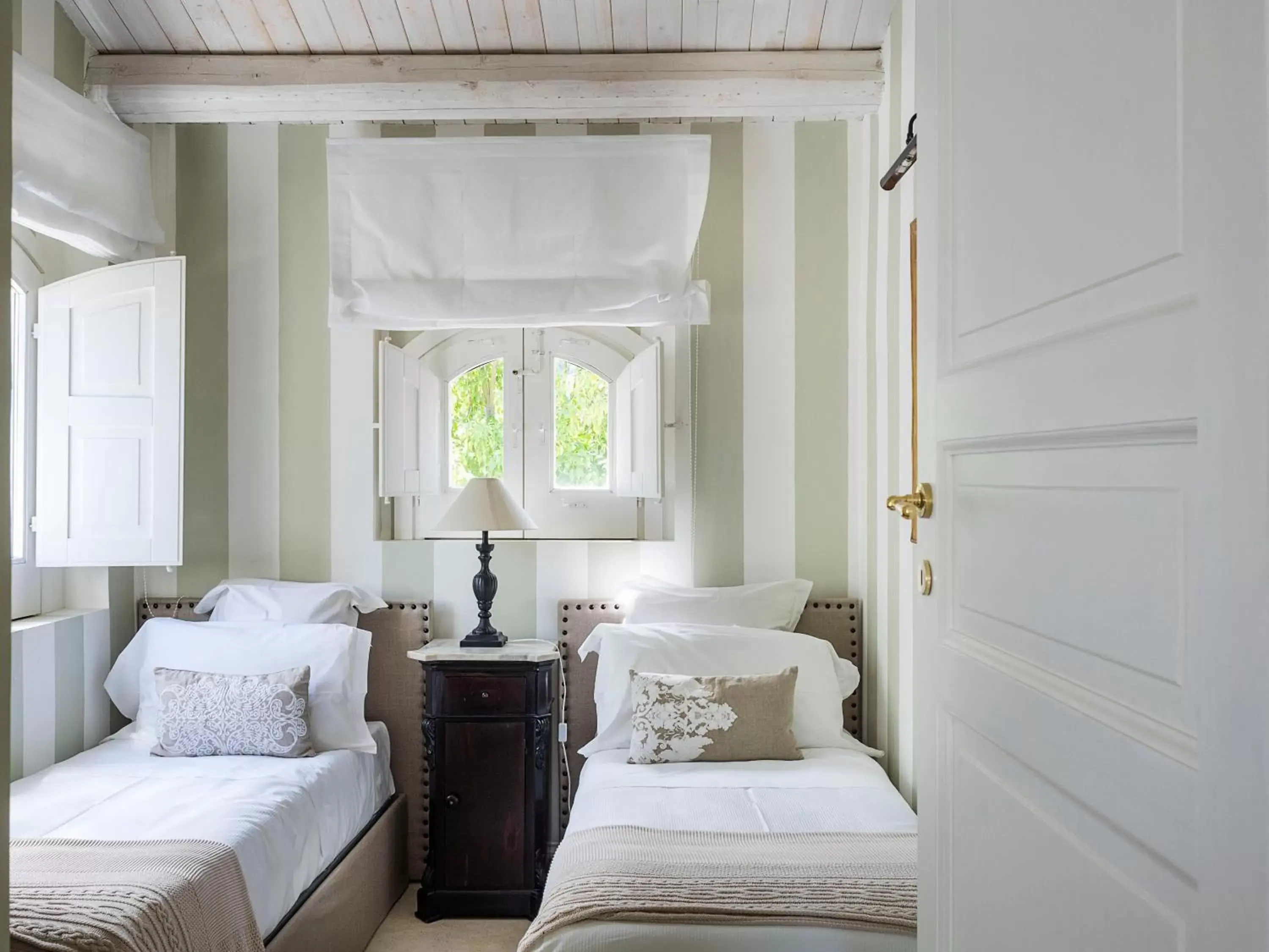 Bed in Donna Carmela Resort & Lodges