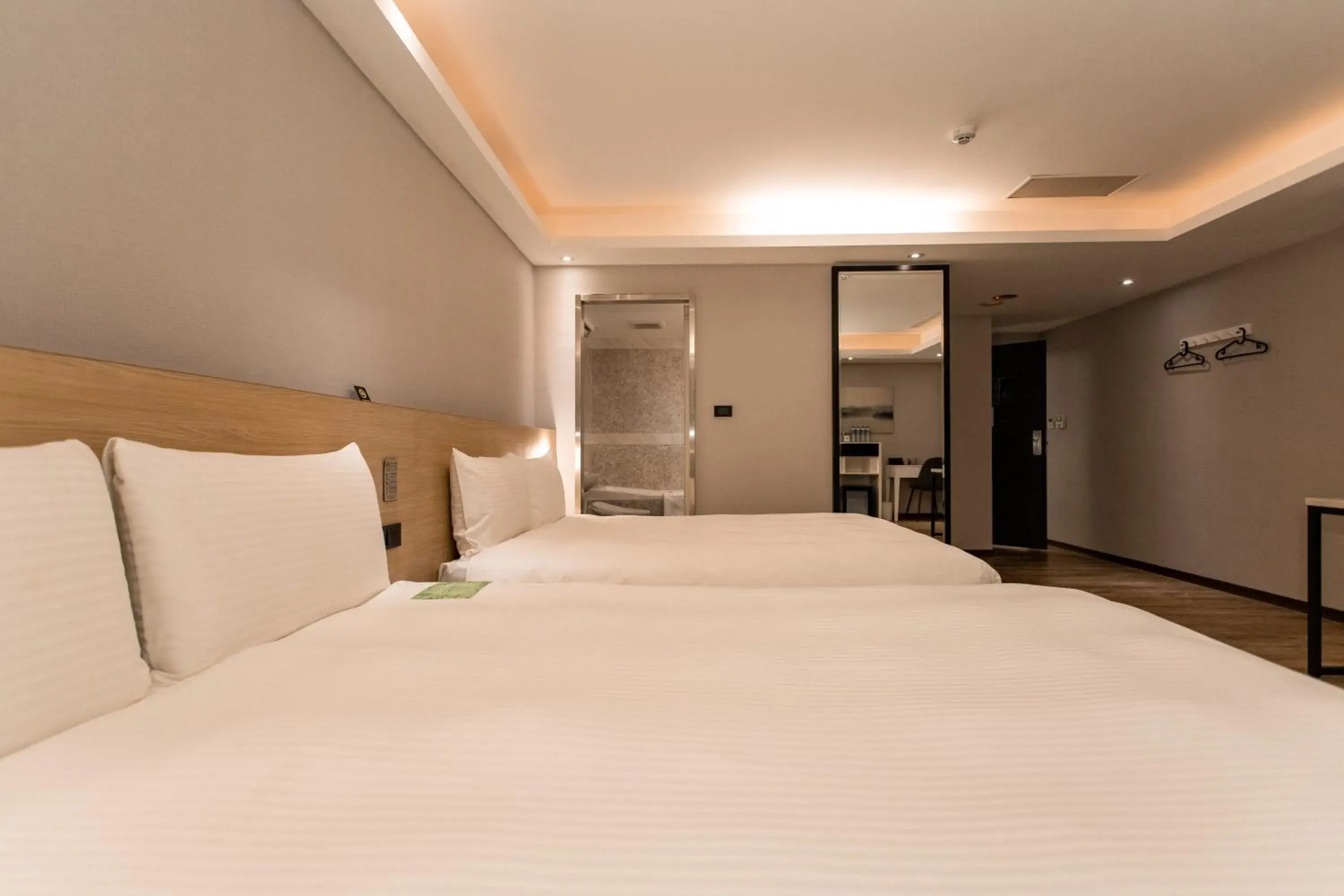 Bed in Hub Hotel Tucheng