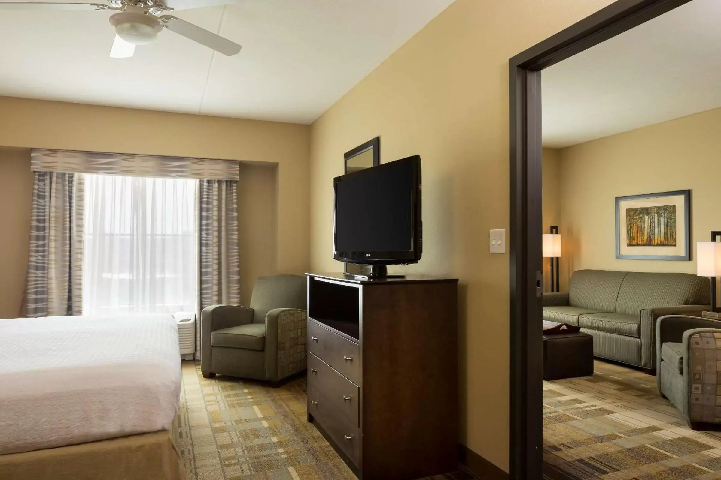 Photo of the whole room, TV/Entertainment Center in Homewood Suites by Hilton Coralville - Iowa River Landing