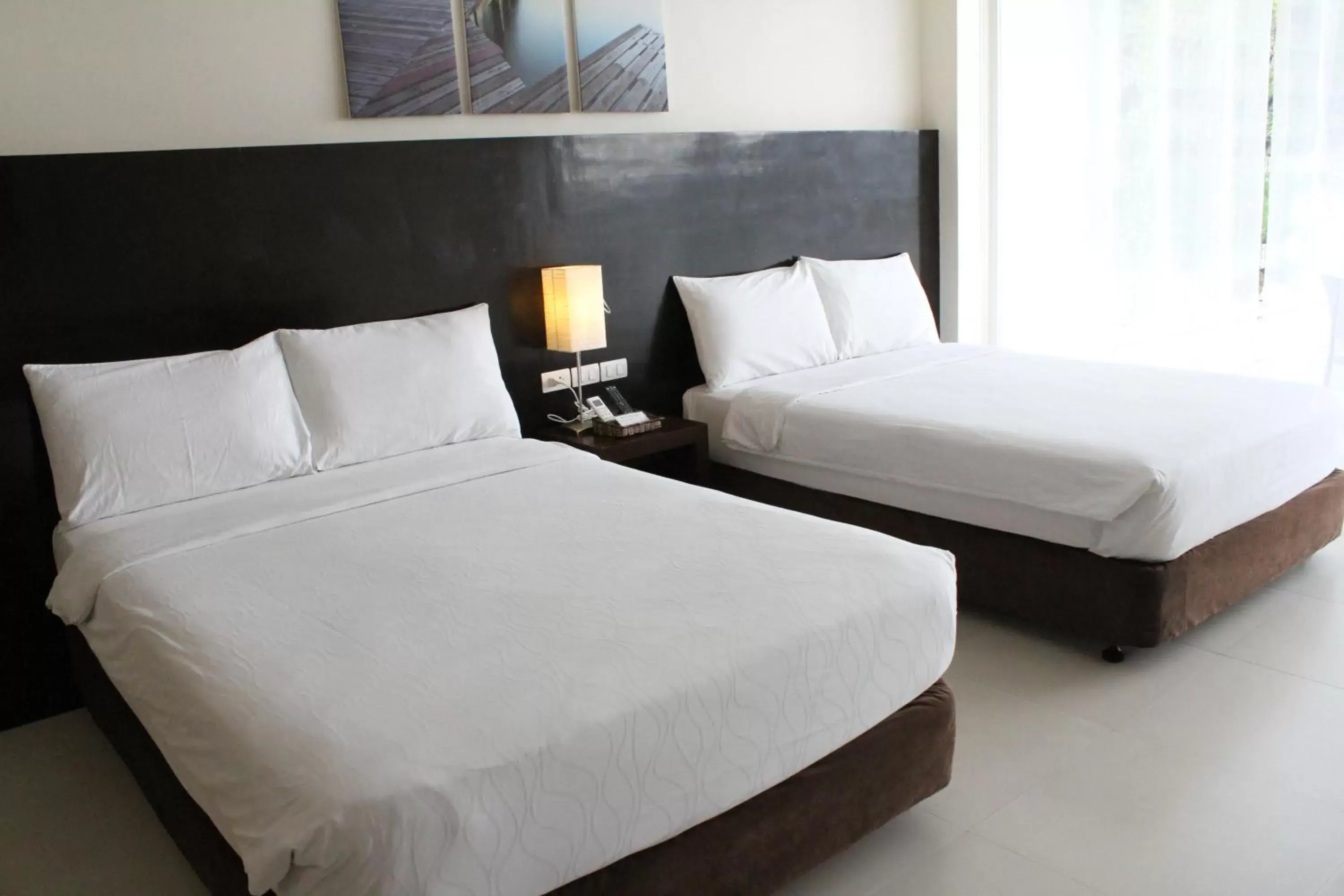 Bedroom, Bed in Ocean Suites Bohol Boutique Hotel