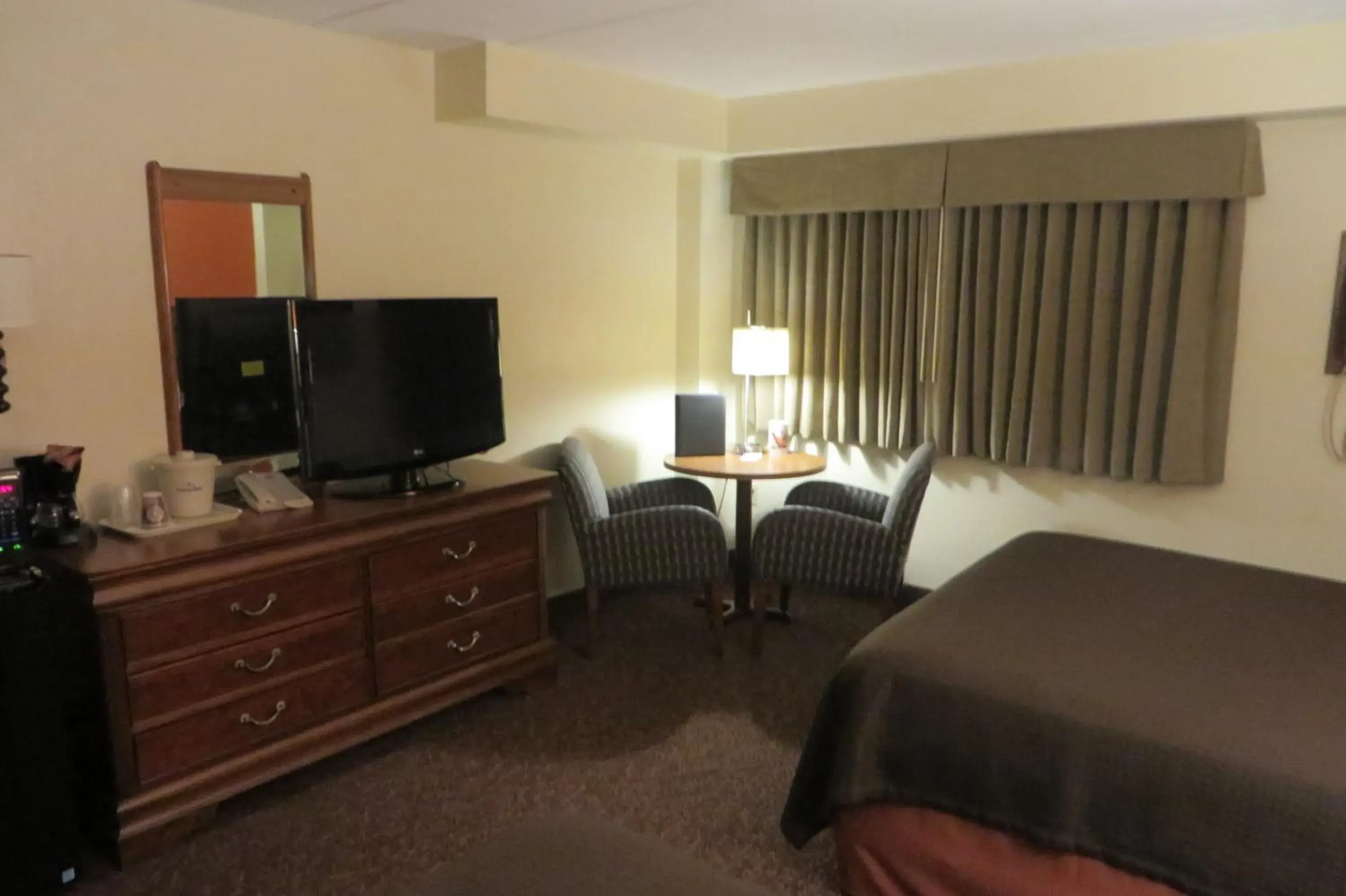 TV and multimedia in AmericInn by Wyndham Forest Lake