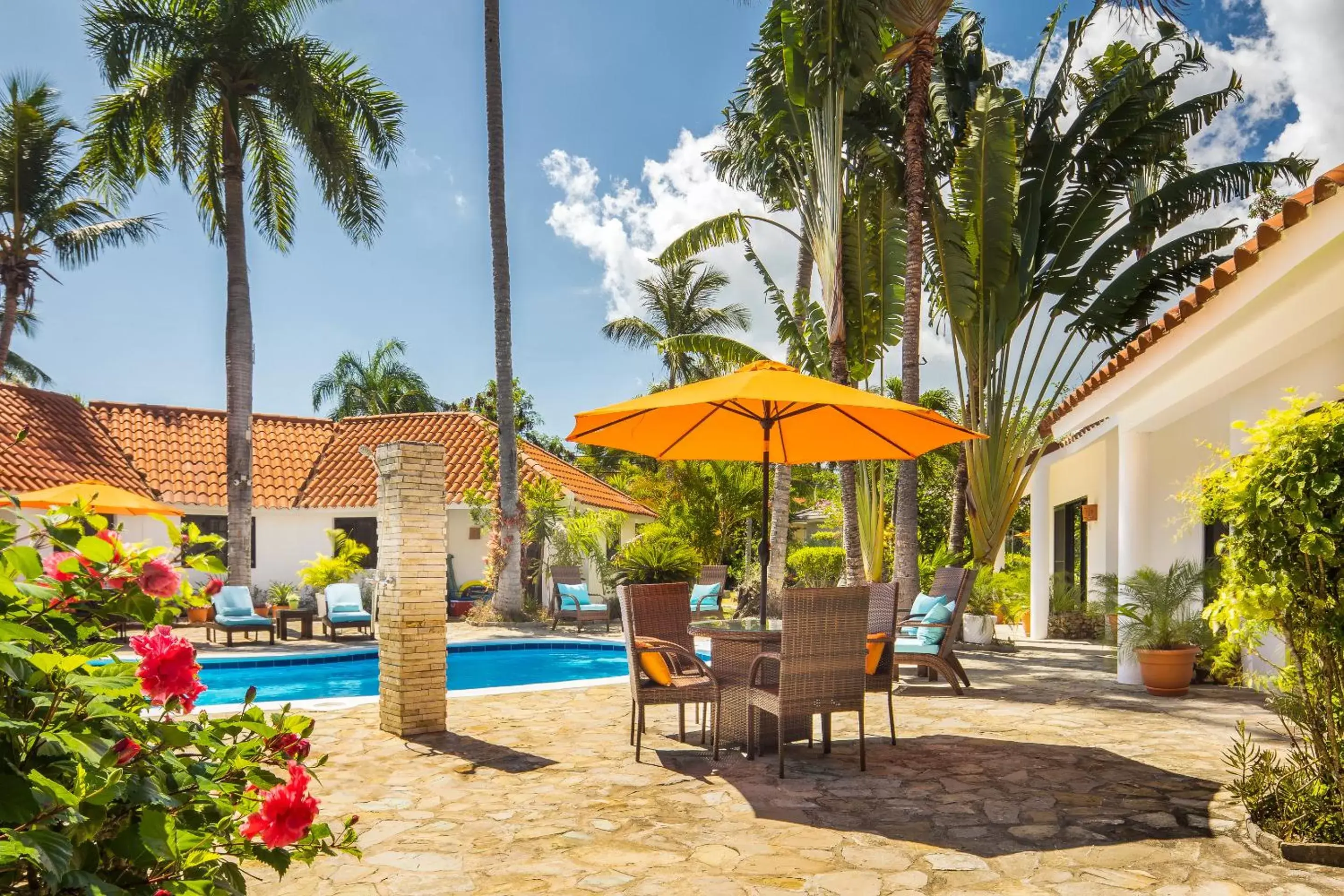 Property building, Swimming Pool in Garden By The Sea