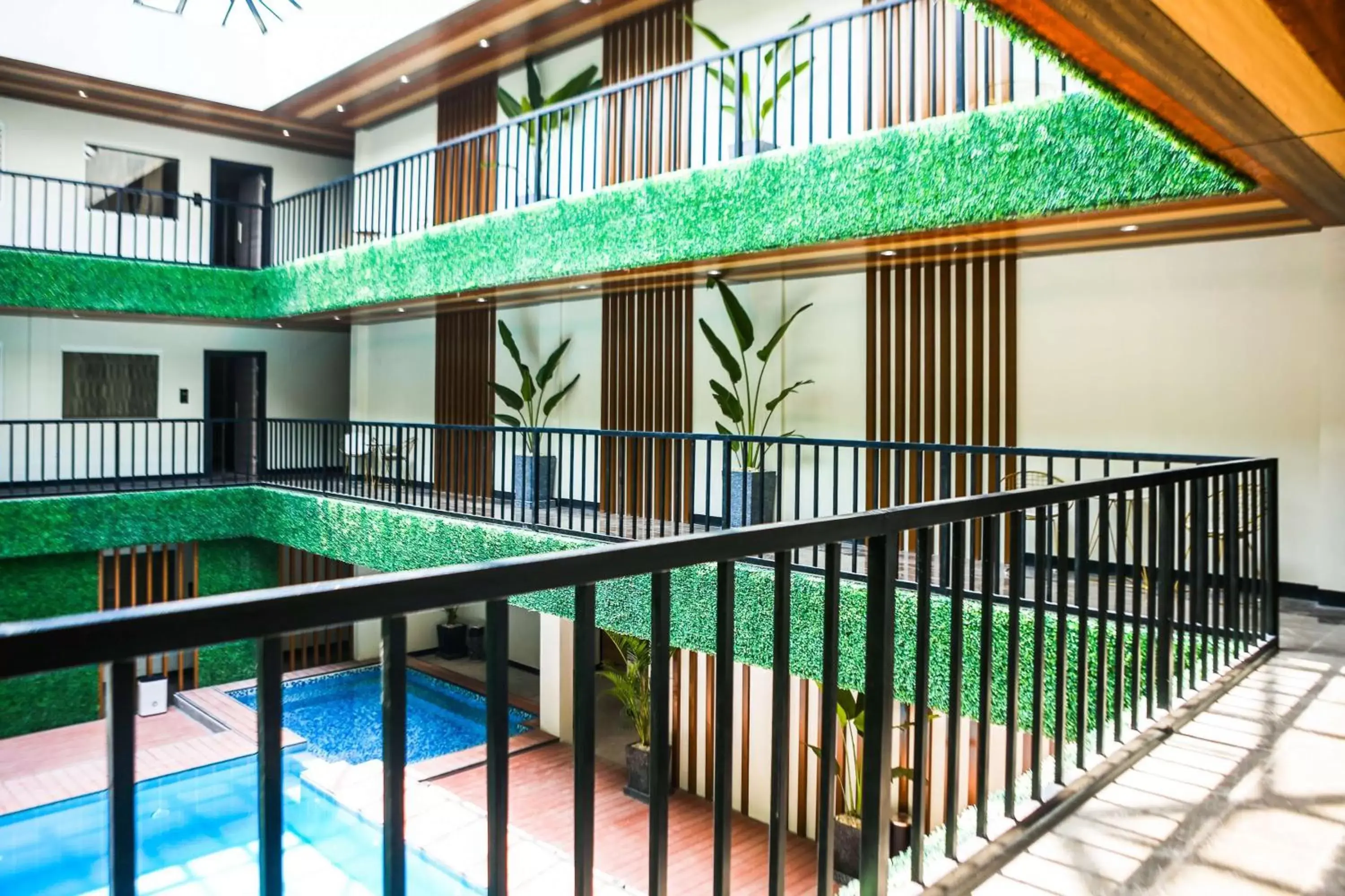 Lobby or reception, Swimming Pool in SureStay Studio by Best Western Clarkview Angeles City