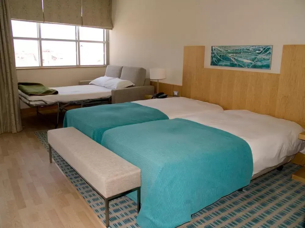 Bed in Hotel Praia