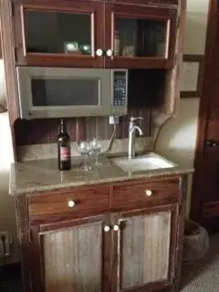 Kitchen or kitchenette in Front Street Inn and Spa