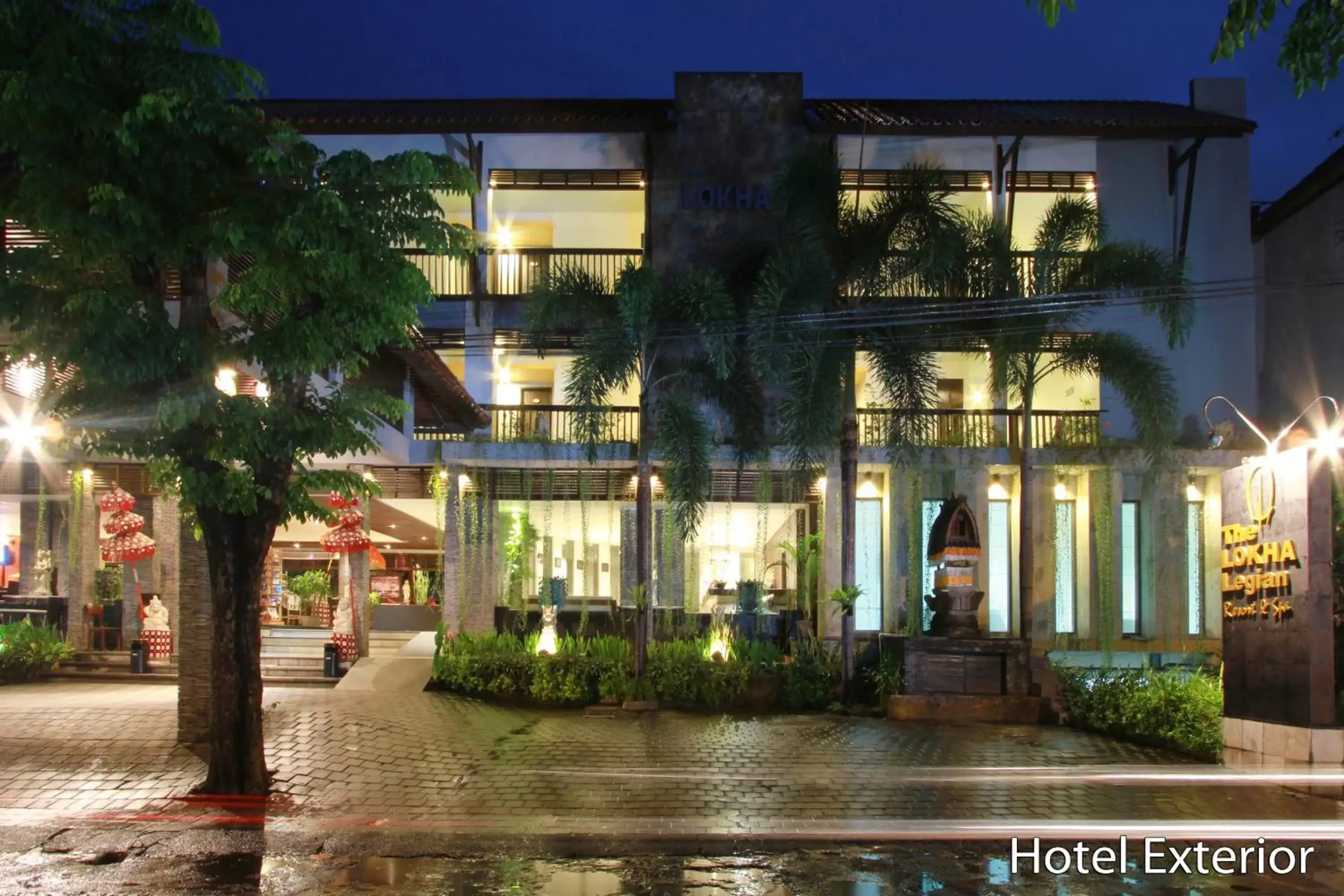 Swimming pool, Property Building in The Lokha Legian Resort & Spa