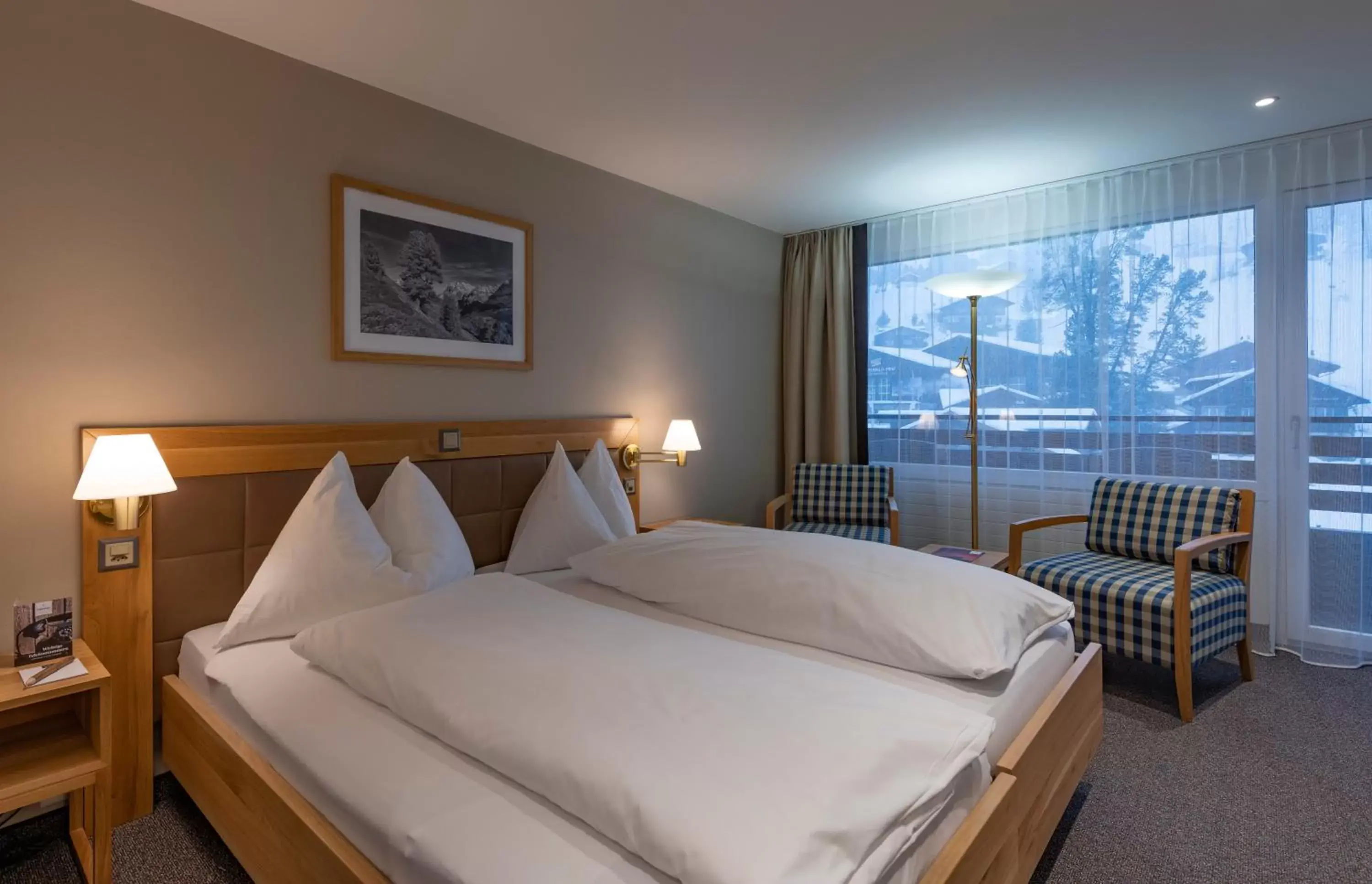 Photo of the whole room, Bed in Sunstar Hotel & SPA Grindelwald