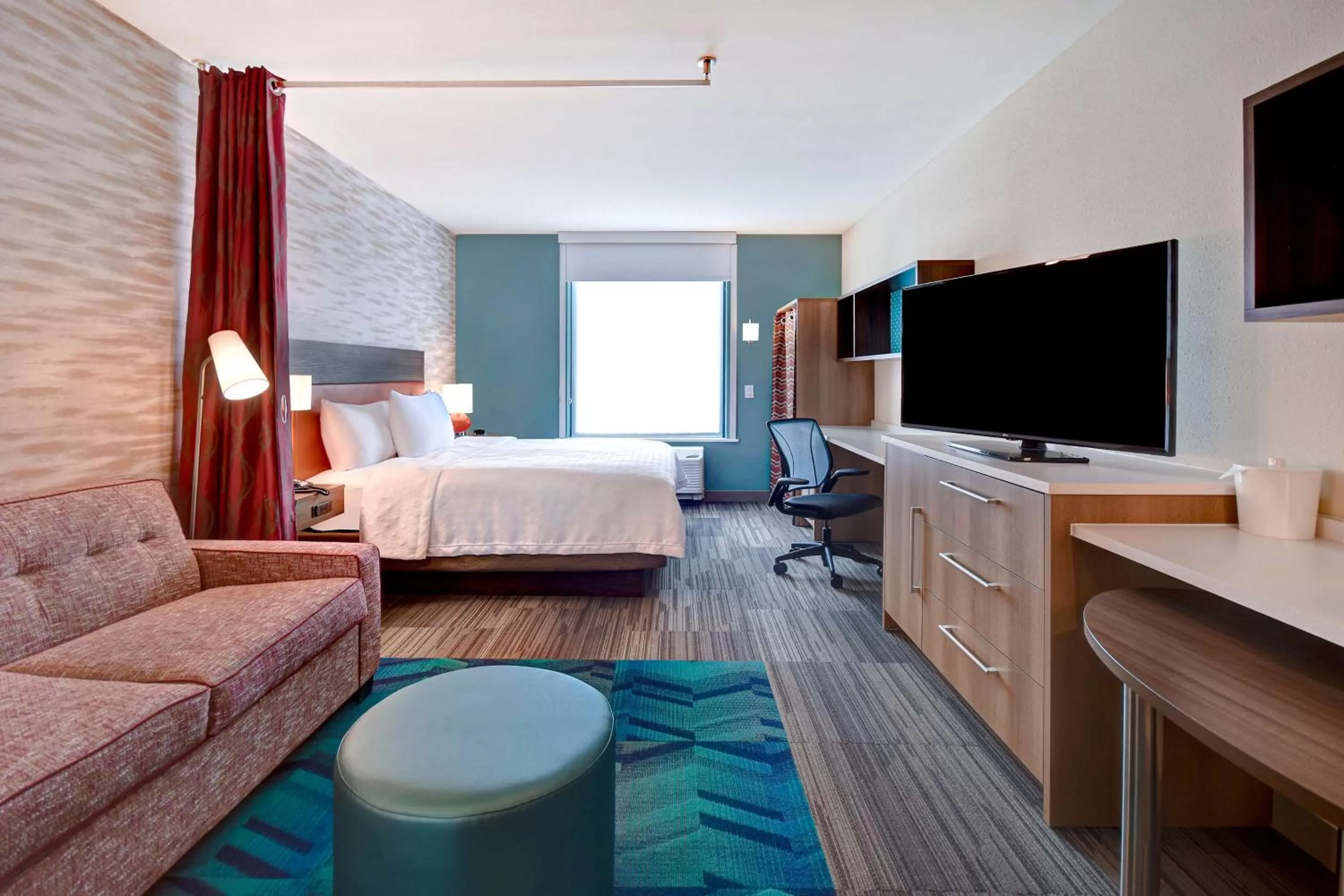 Living room, Bed in Home2 Suites By Hilton Kalamazoo Downtown, Mi