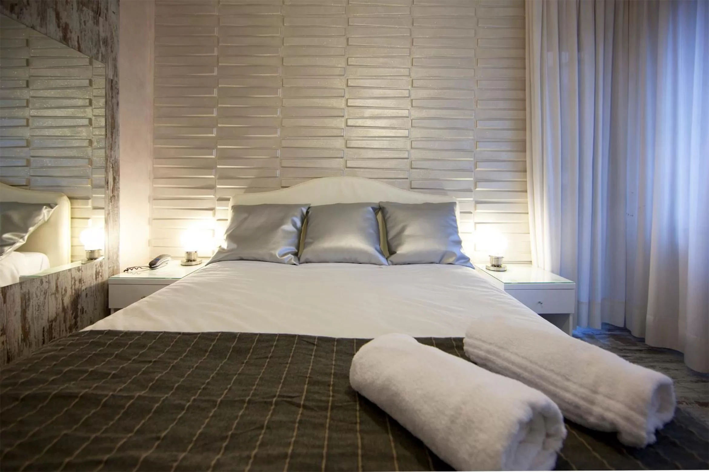 Bed in Piccolo Hotel Allamano