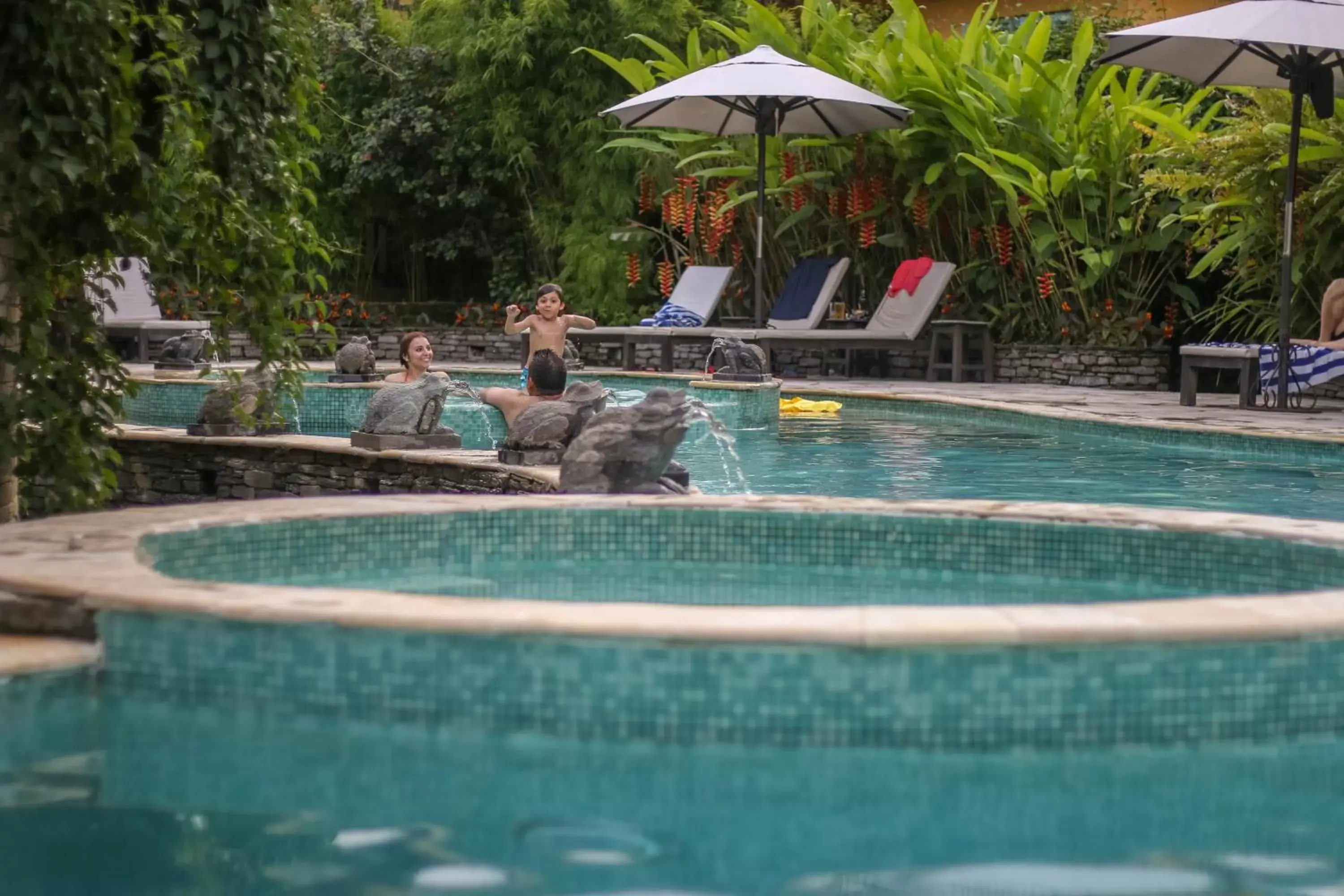 People, Swimming Pool in Temple Tree Resort & Spa