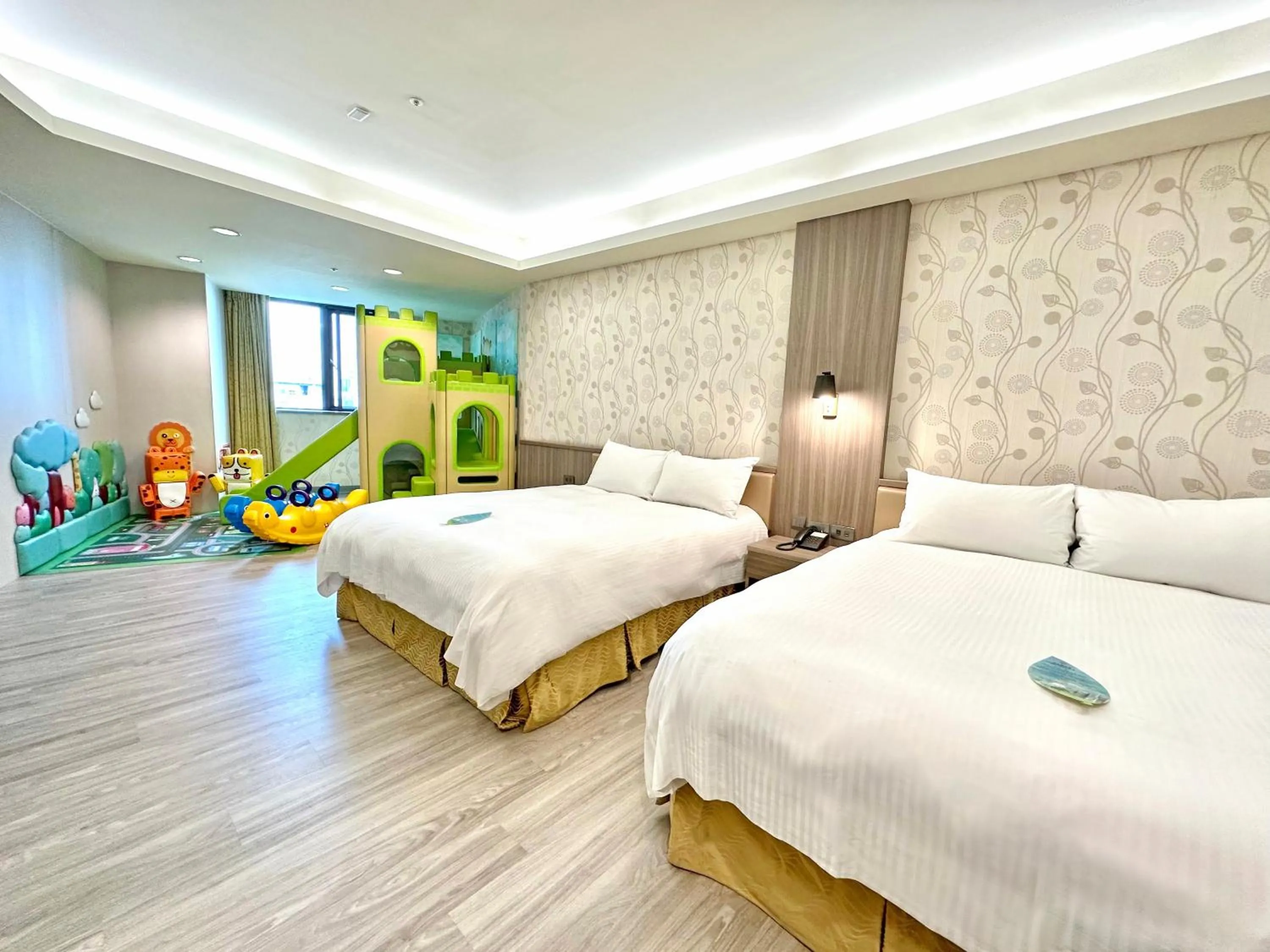 Bed in Grand Earl Hotel