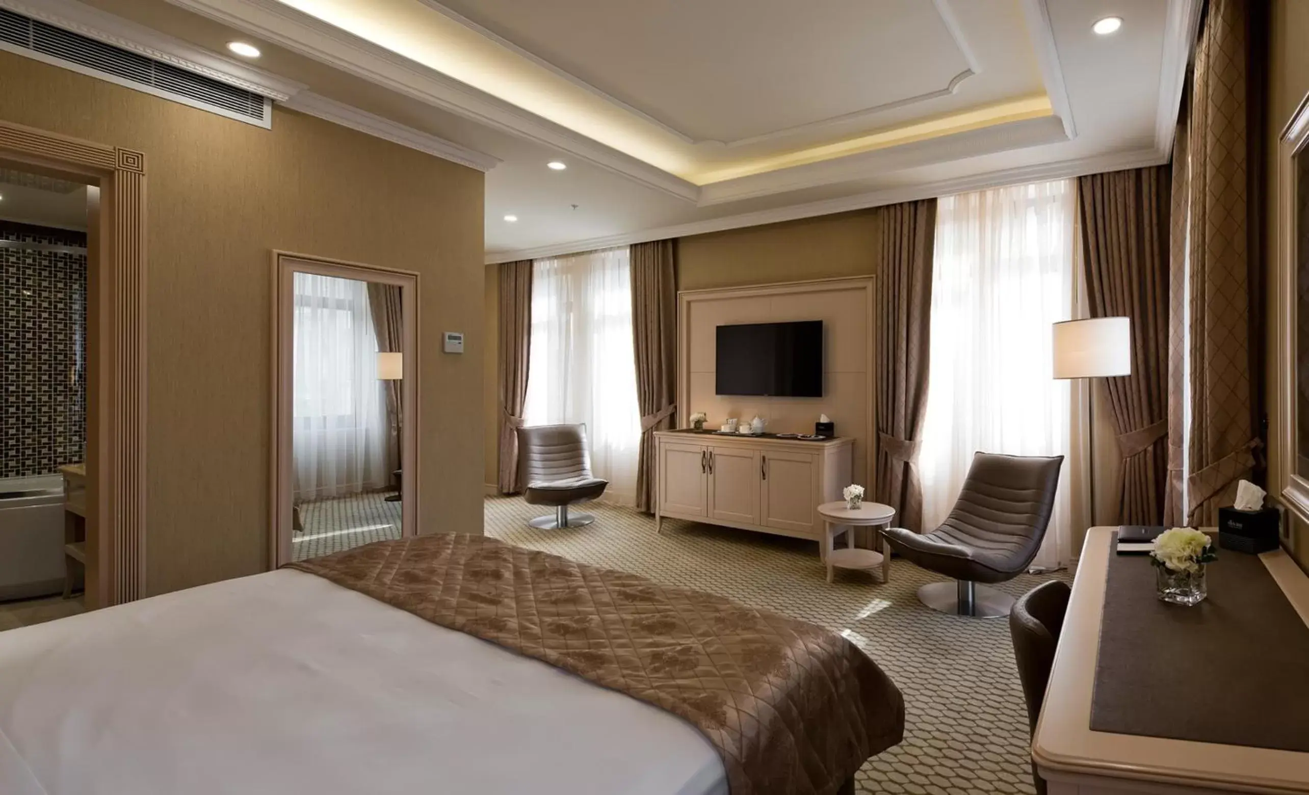 Bedroom, TV/Entertainment Center in Divan Suites Batumi