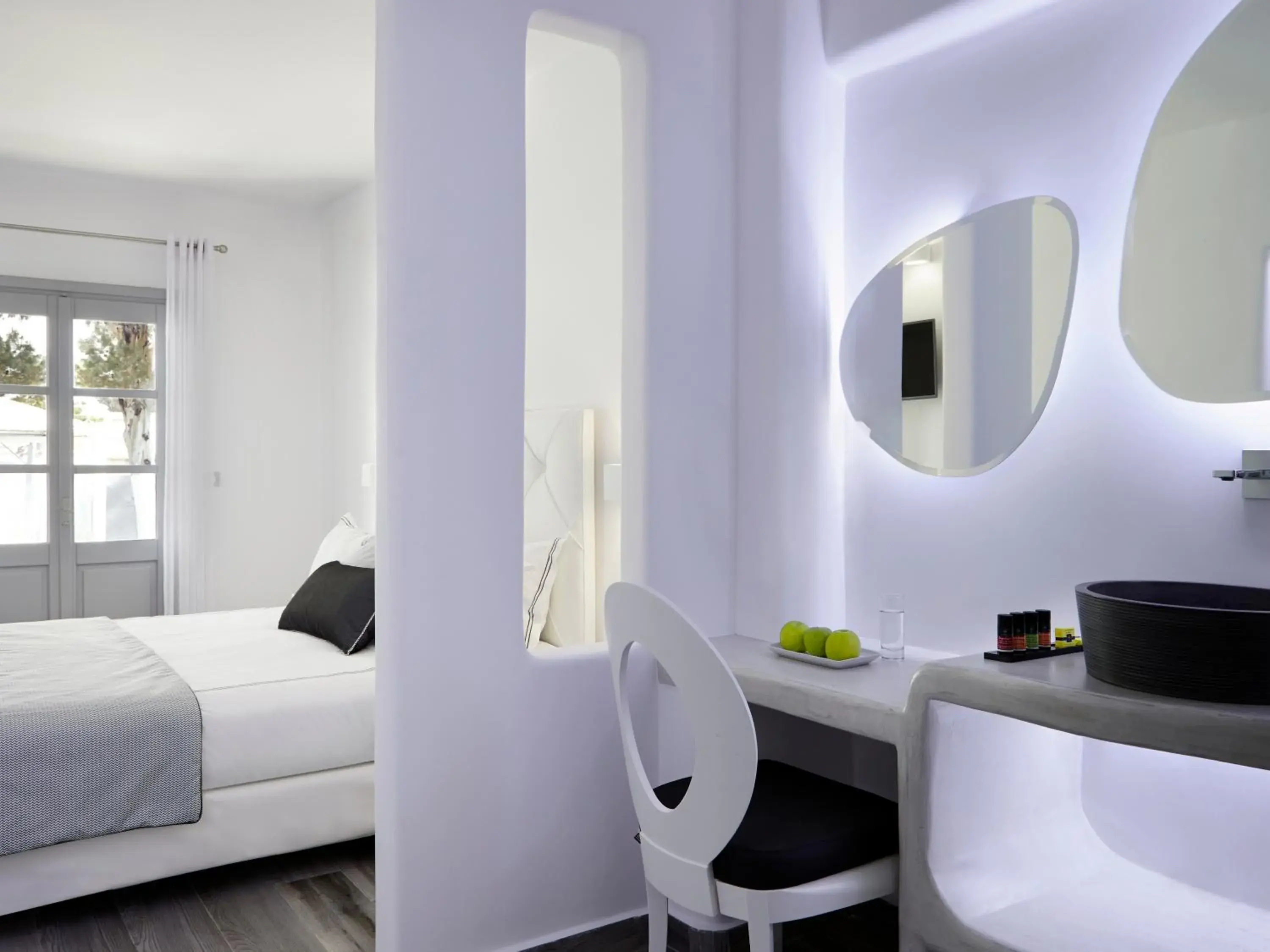 Elegant White Deluxe Room with Private Balcony in Kalisti Hotel & Suites Elegant White Deluxe Room with Private Balcony in Kalisti Hotel & Suites