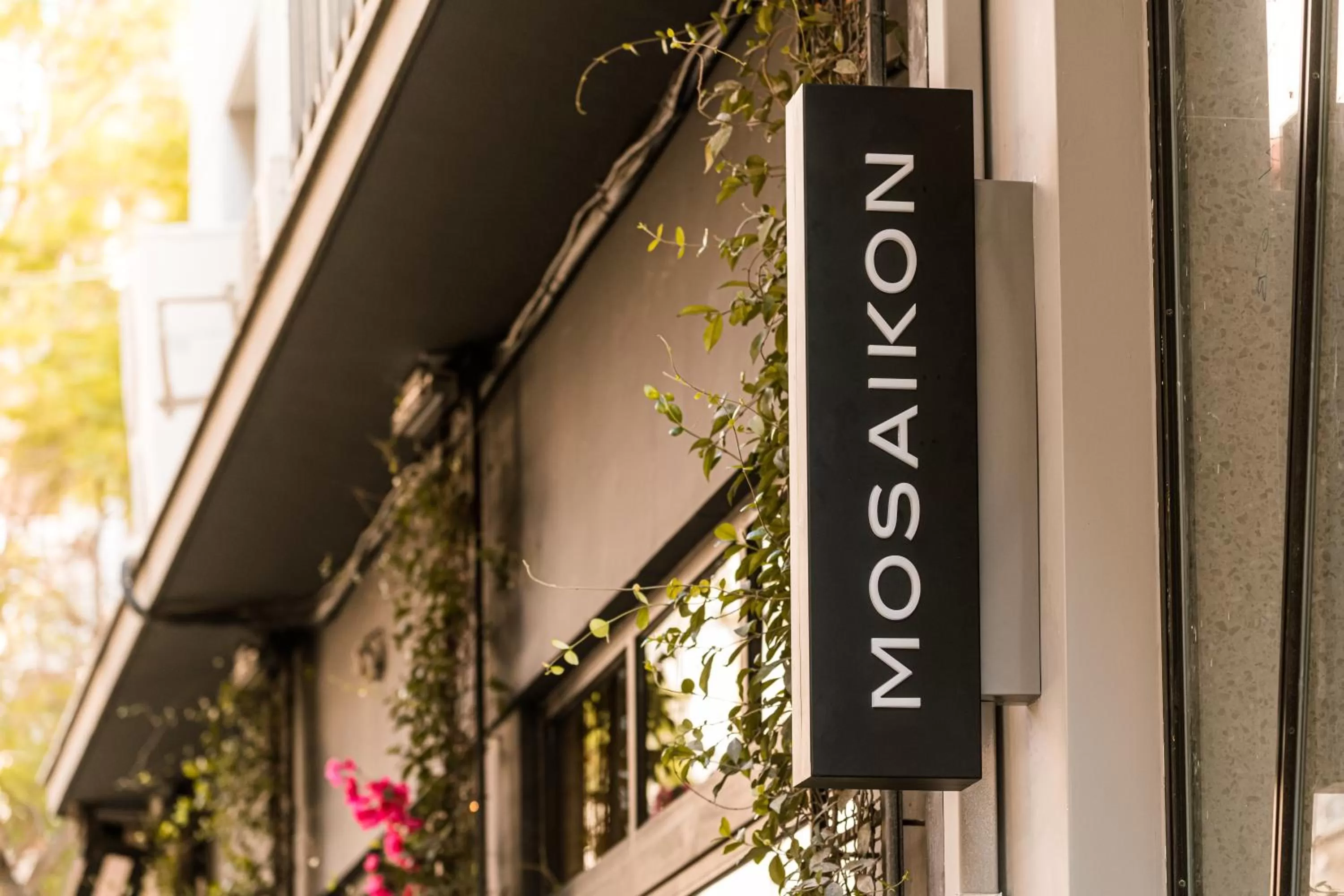 Property logo or sign in Mosaikon