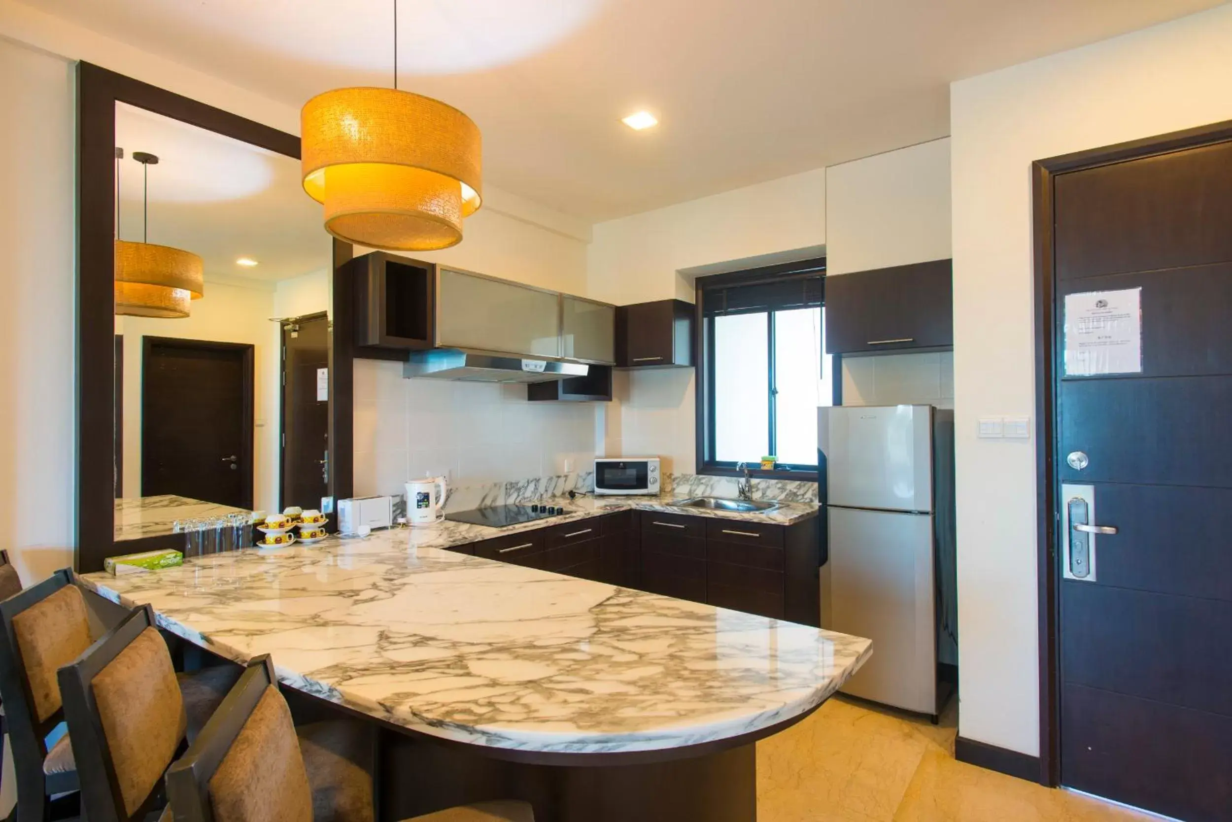 Kitchen or kitchenette in Sabah Beach Villas & Suites