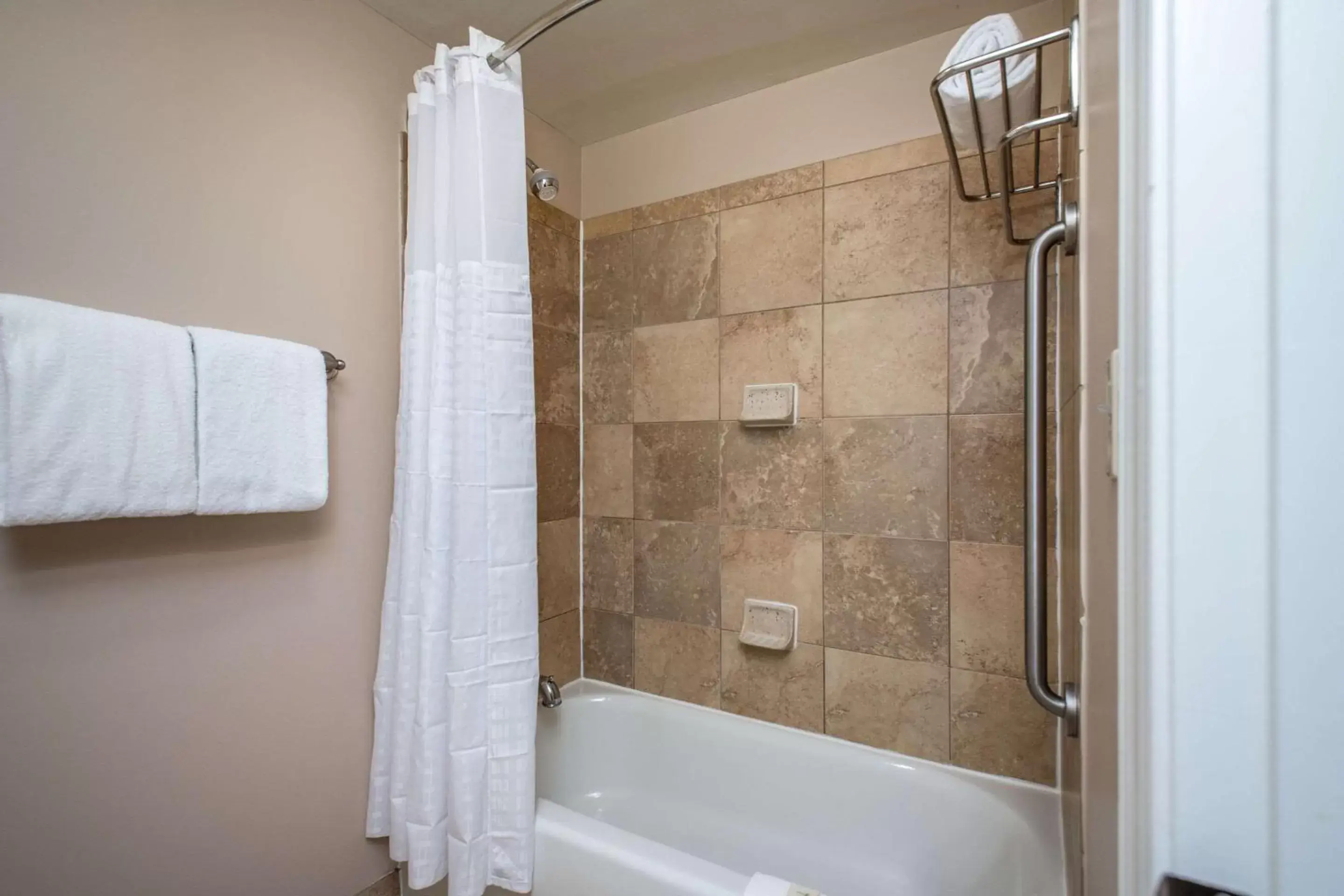 Bathroom in Clarion Collection Hotel Arlington Court Suites