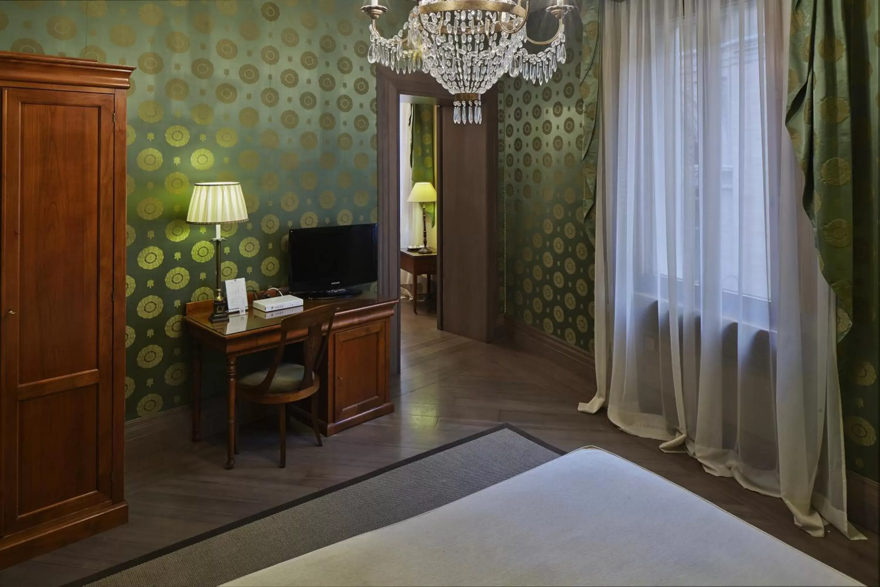 Decorative detail, TV/Entertainment Center in Albergo Cappello