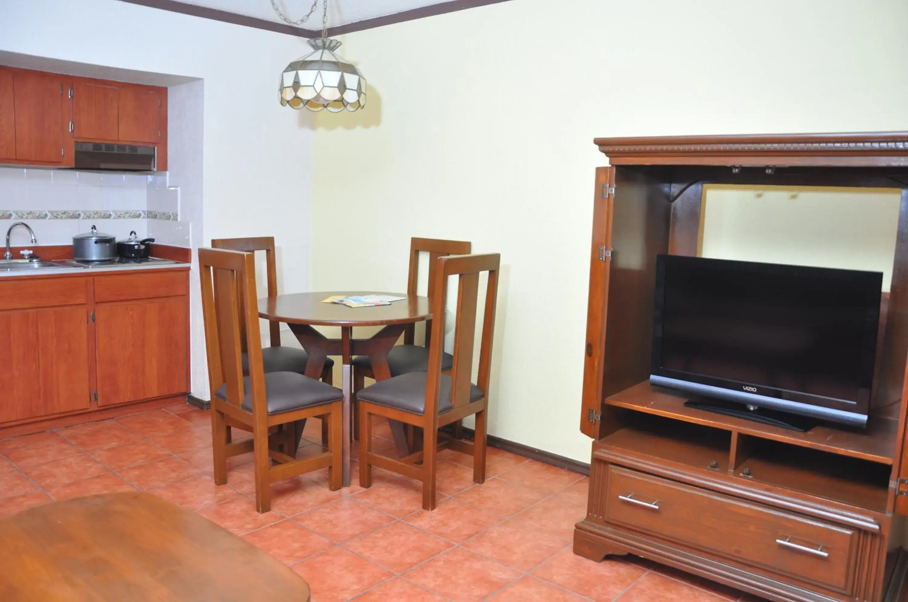 Kitchen or kitchenette, TV/Entertainment Center in Rosarito Beach Hotel