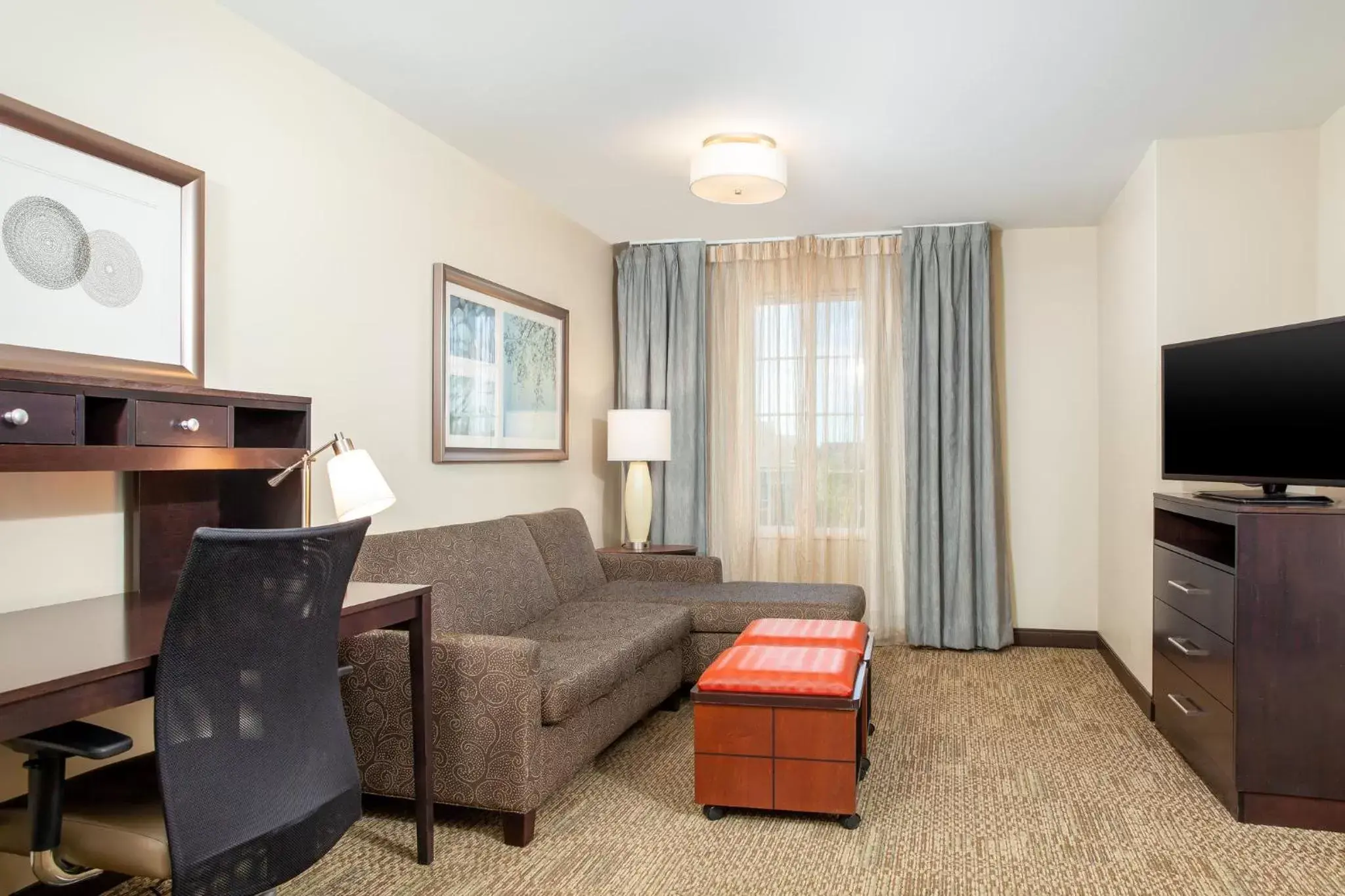 Photo of the whole room, Seating Area in Staybridge Suites Denver - Central Park, an IHG Hotel