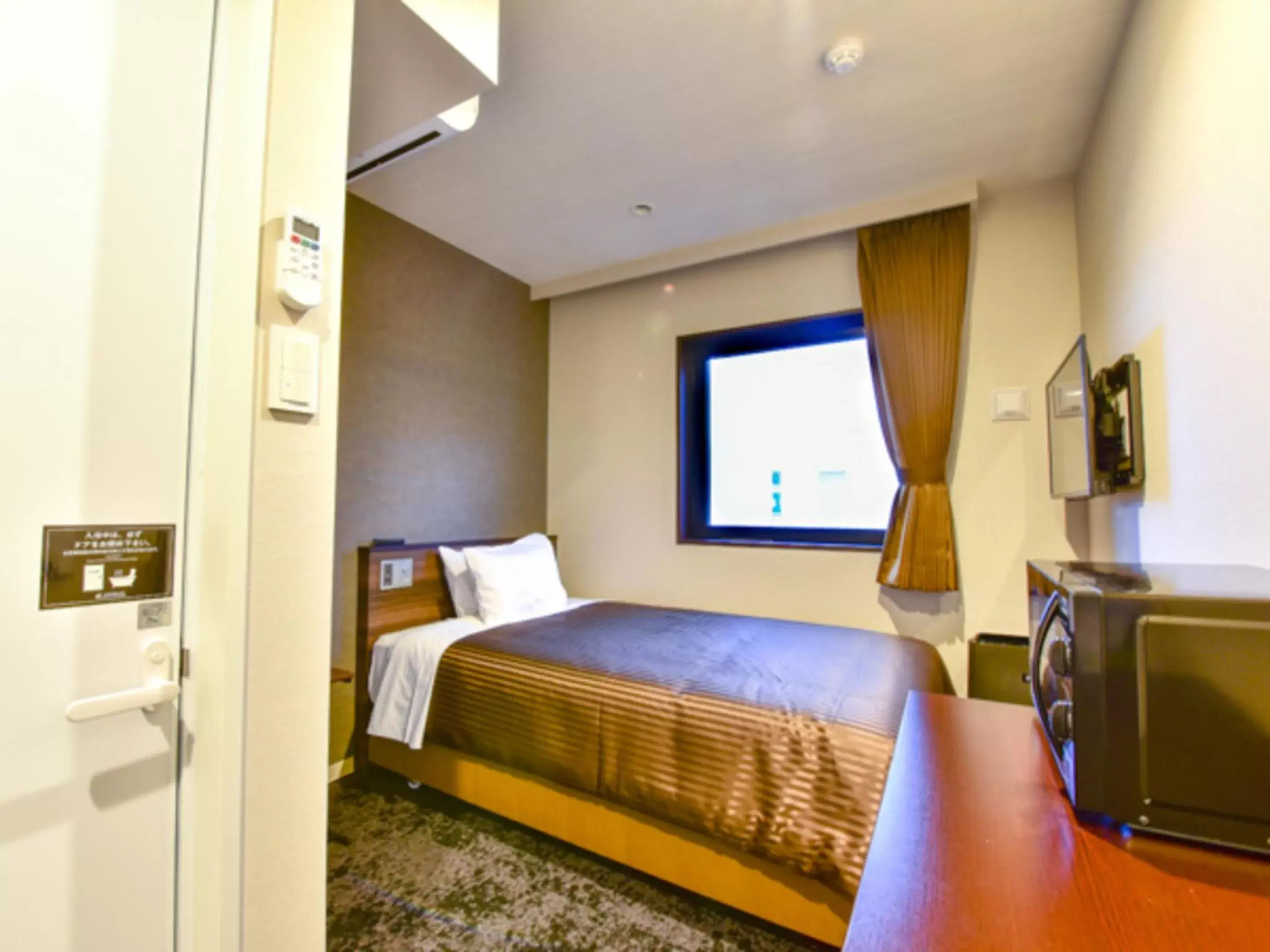 Bed in HOTEL LiVEMAX Fukuoka Tenjin West