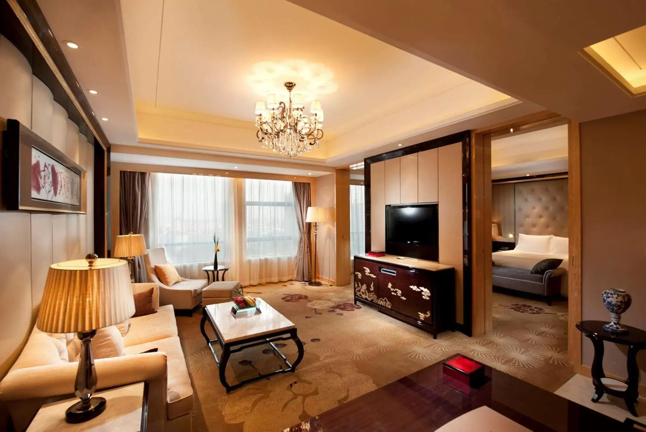 Bed, Seating Area in Hilton Nanjing