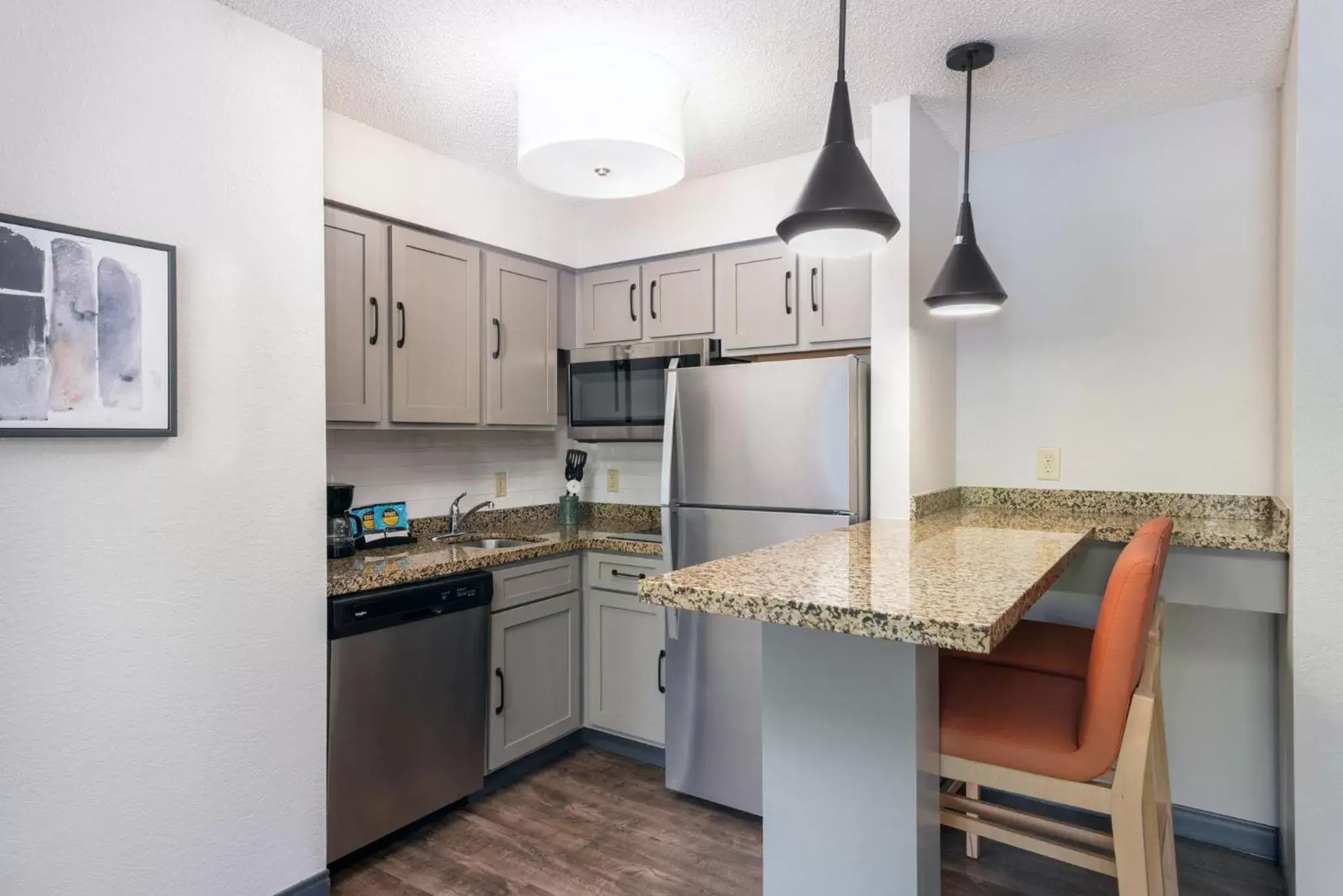 Photo of the whole room, Kitchen/Kitchenette in Candlewood Suites Eagan - Mall of America Area, an IHG Hotel