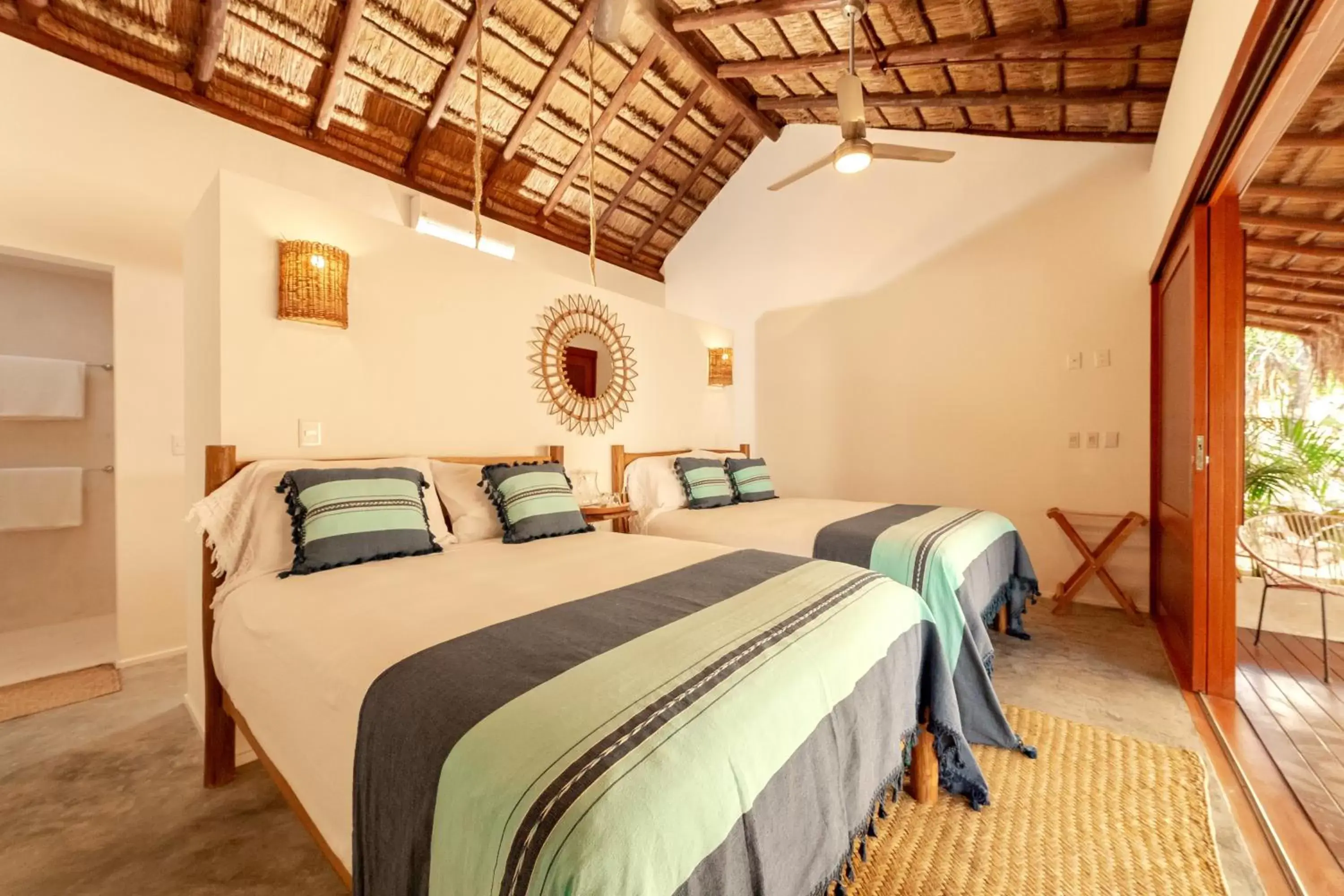 Photo of the whole room, Bed in Mimosa Tulum