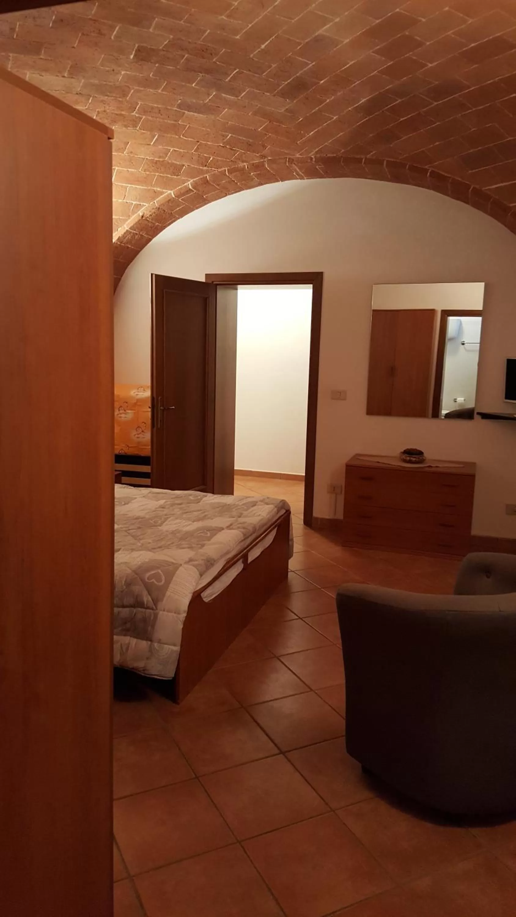 Photo of the whole room, Bed in Orto degli Ulivi