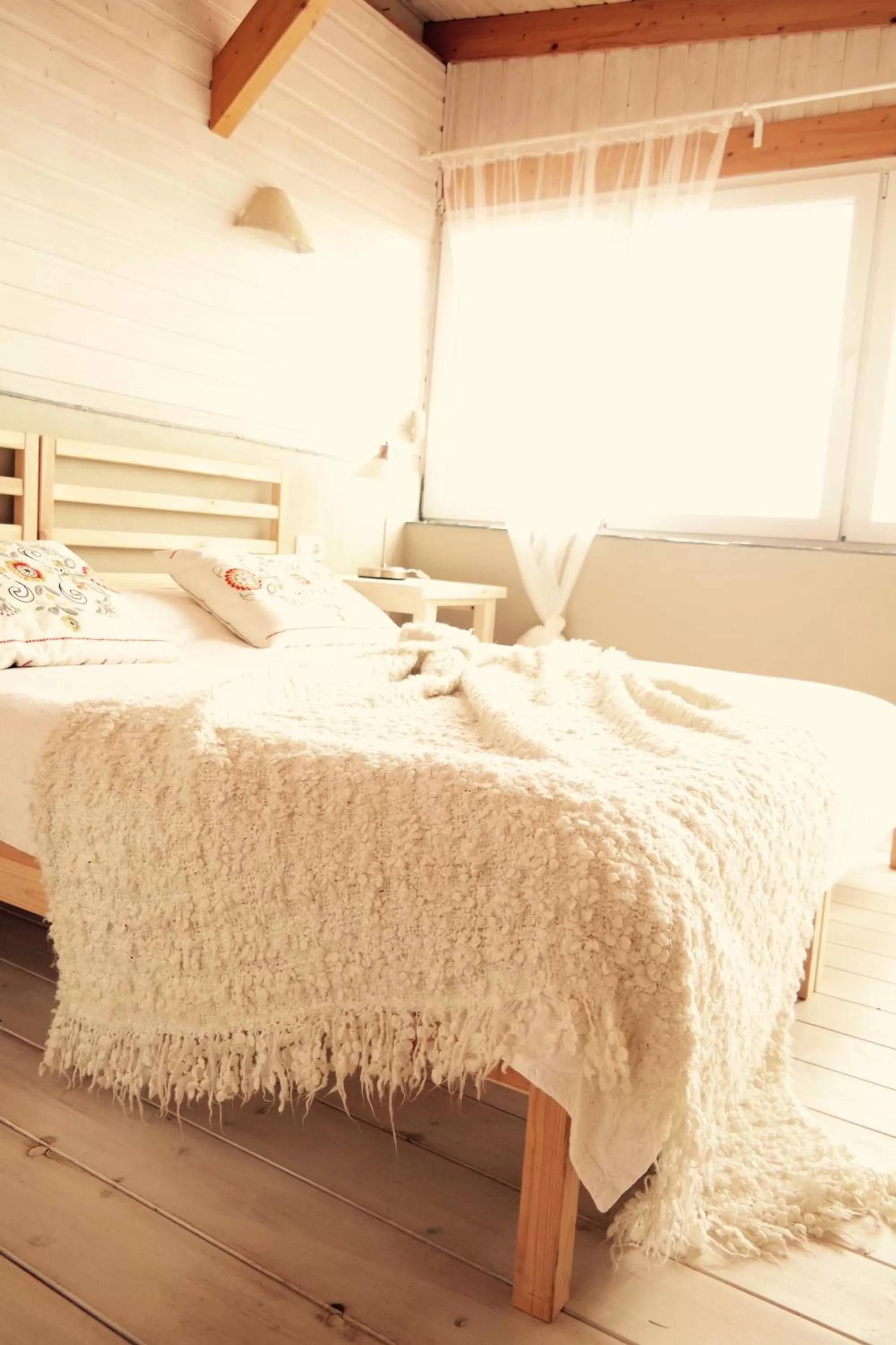 Bed in Sansofi Guesthouse