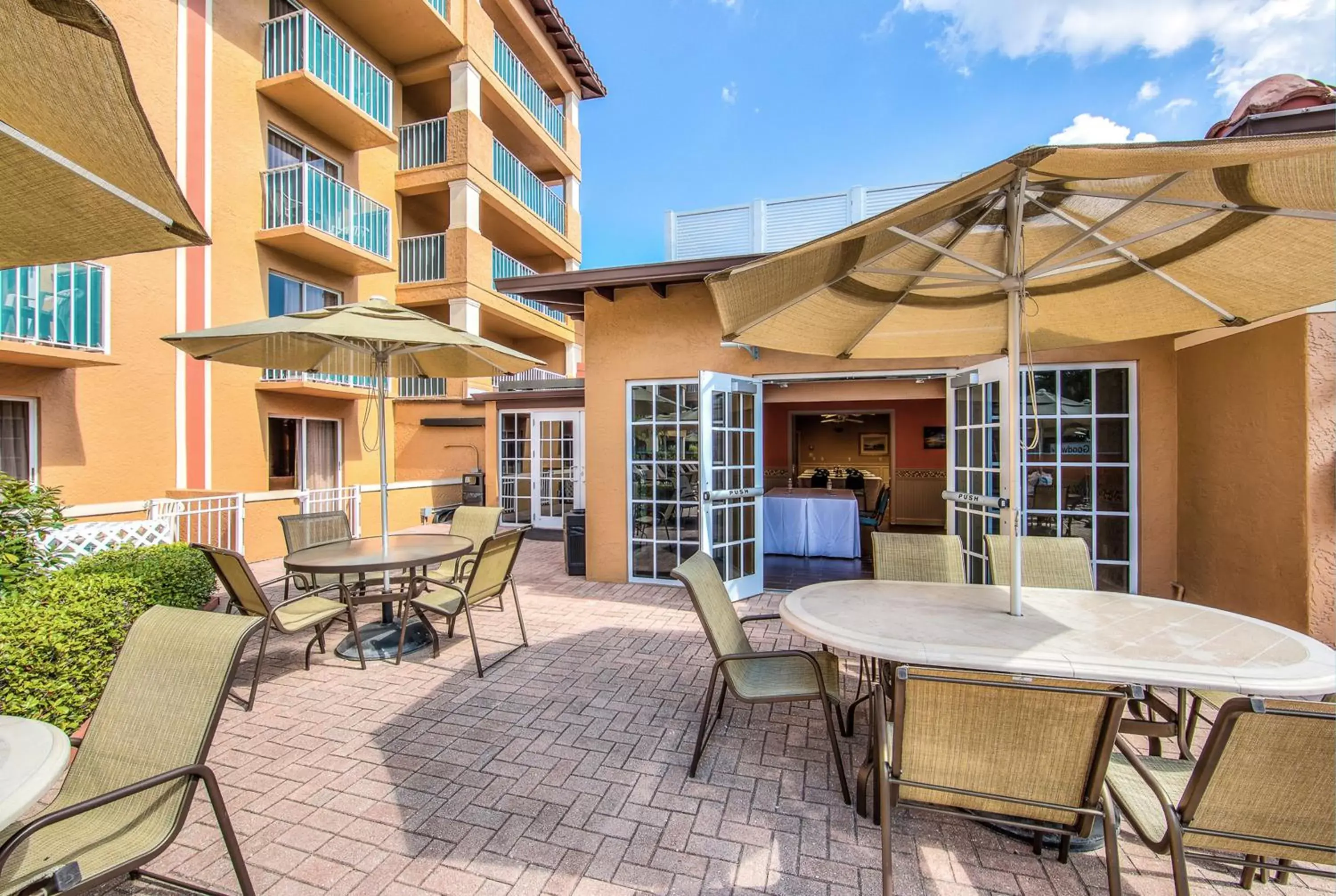 Patio in Inn of Naples, Tapestry Collection by Hilton