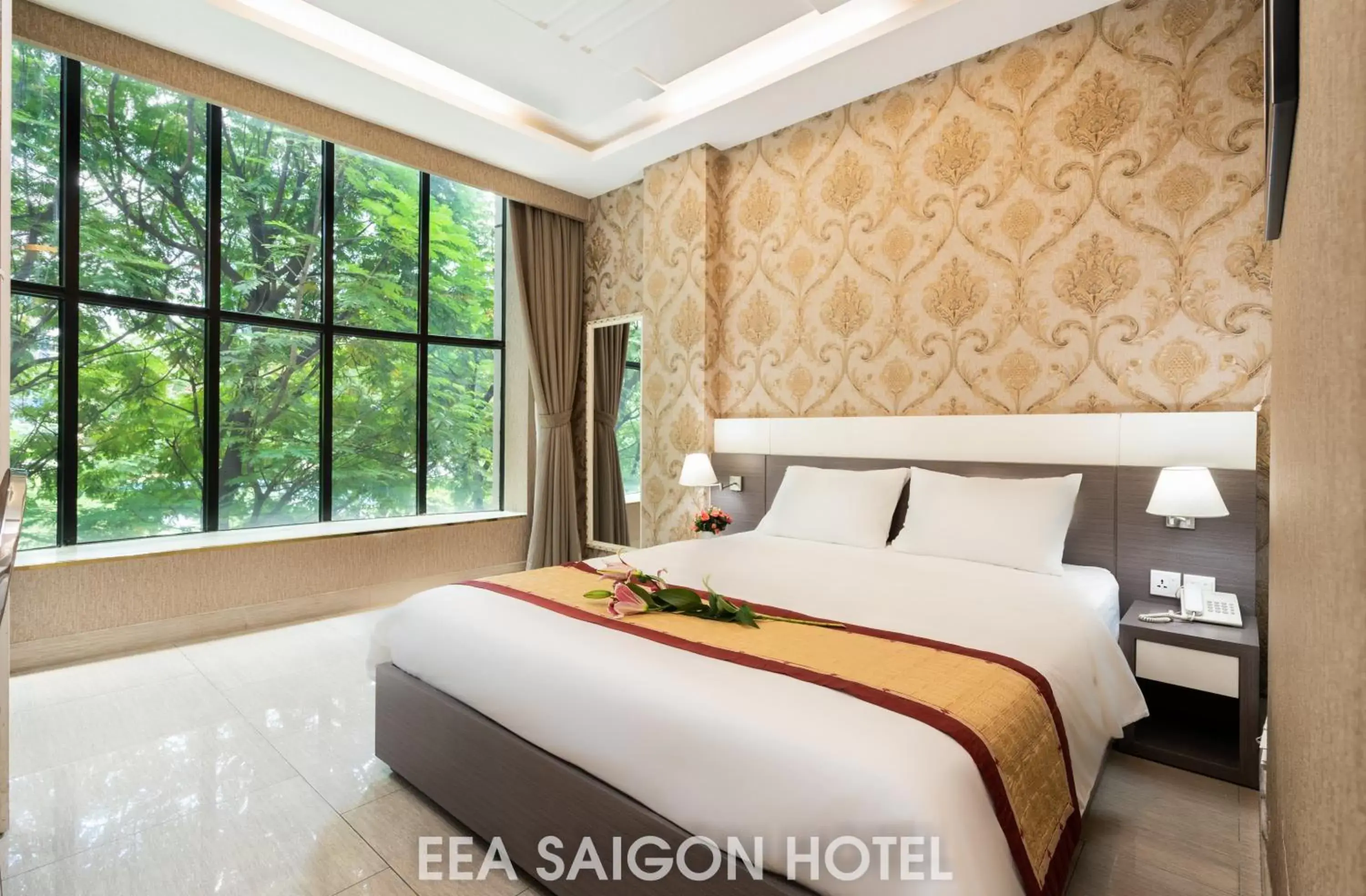 Bed in EEA Central Saigon Hotel