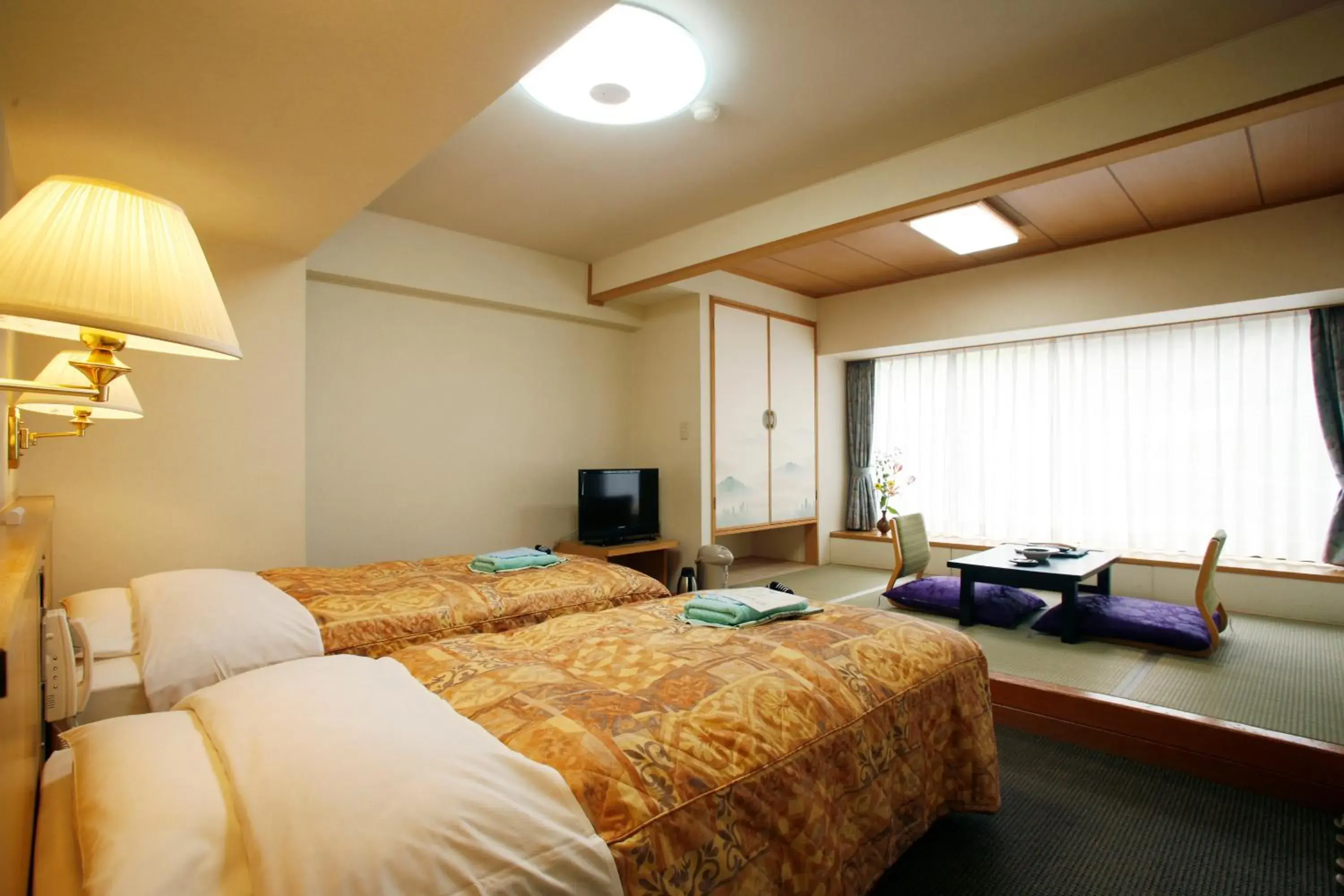 Photo of the whole room, Bed in Sounkyo Kanko Hotel