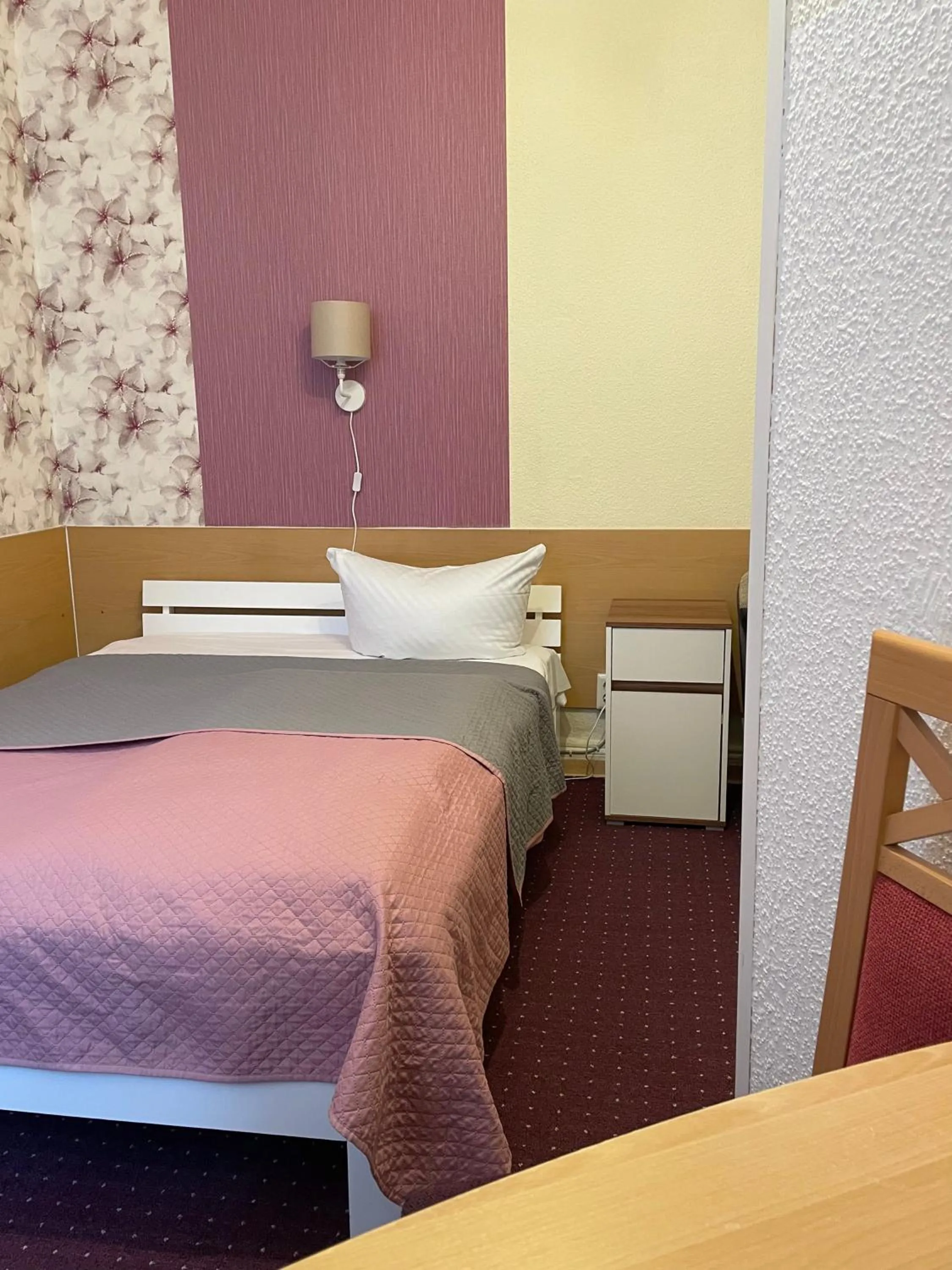 Bed in Hotel Castell am Kurfürstendamm