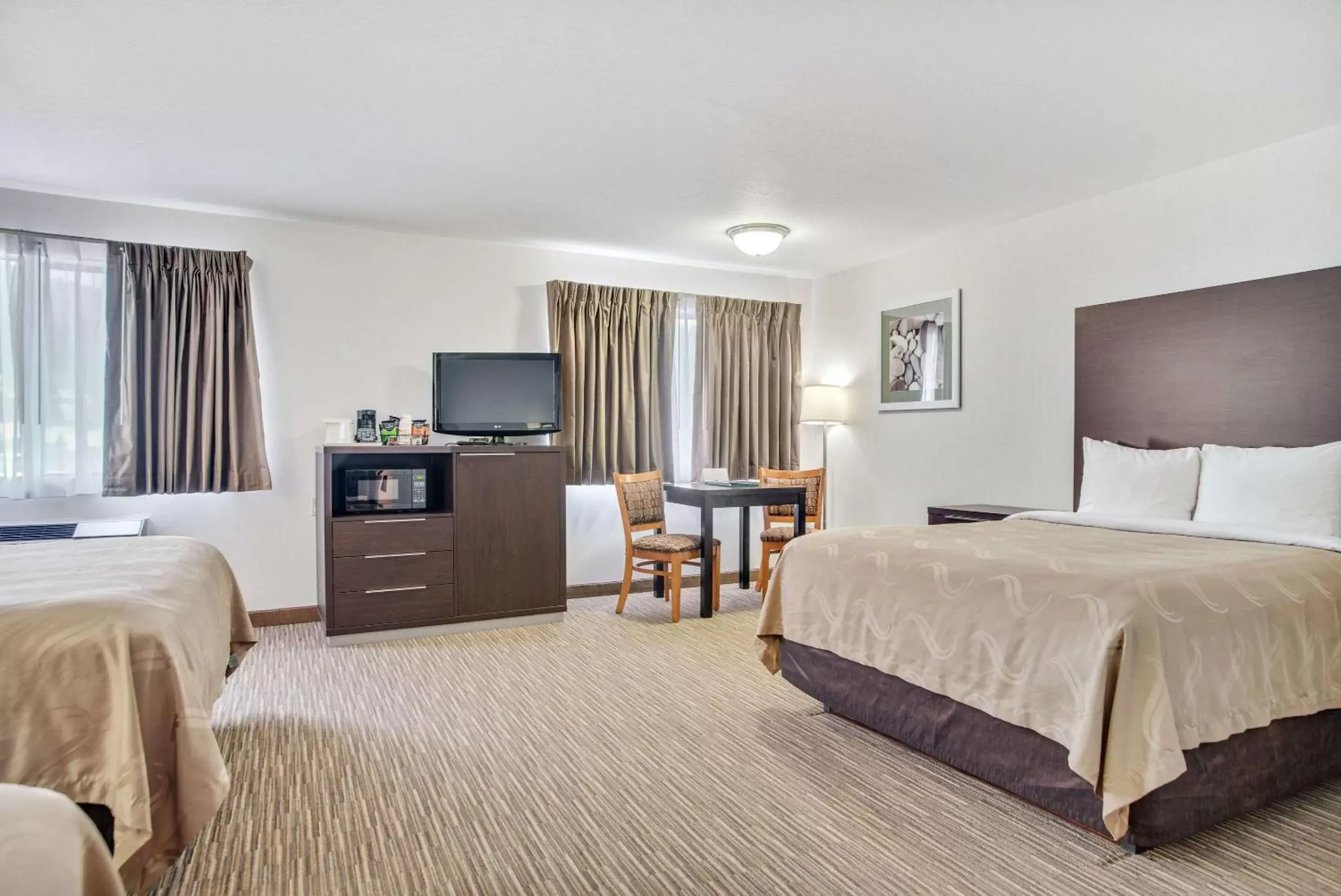 Photo of the whole room, Bed in EverSpring Inn & Suites