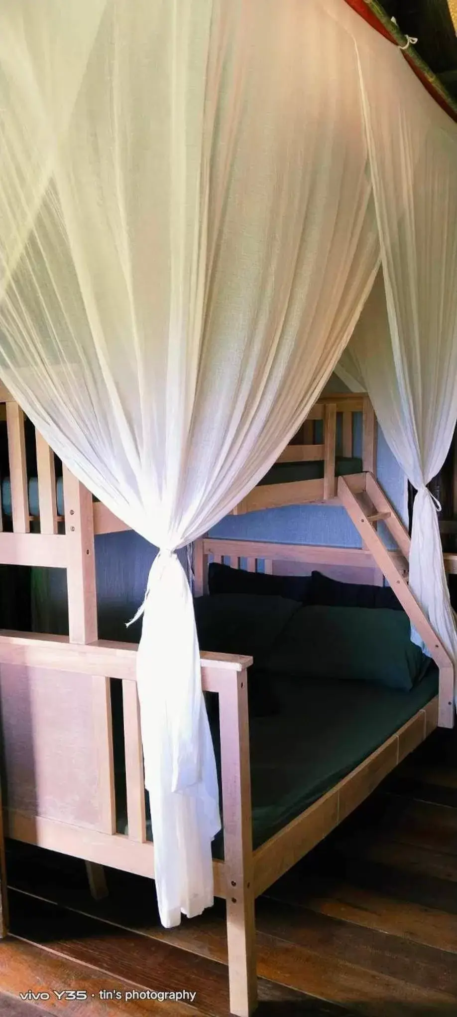 Bed in Sanctuaria Treehouses Busuanga