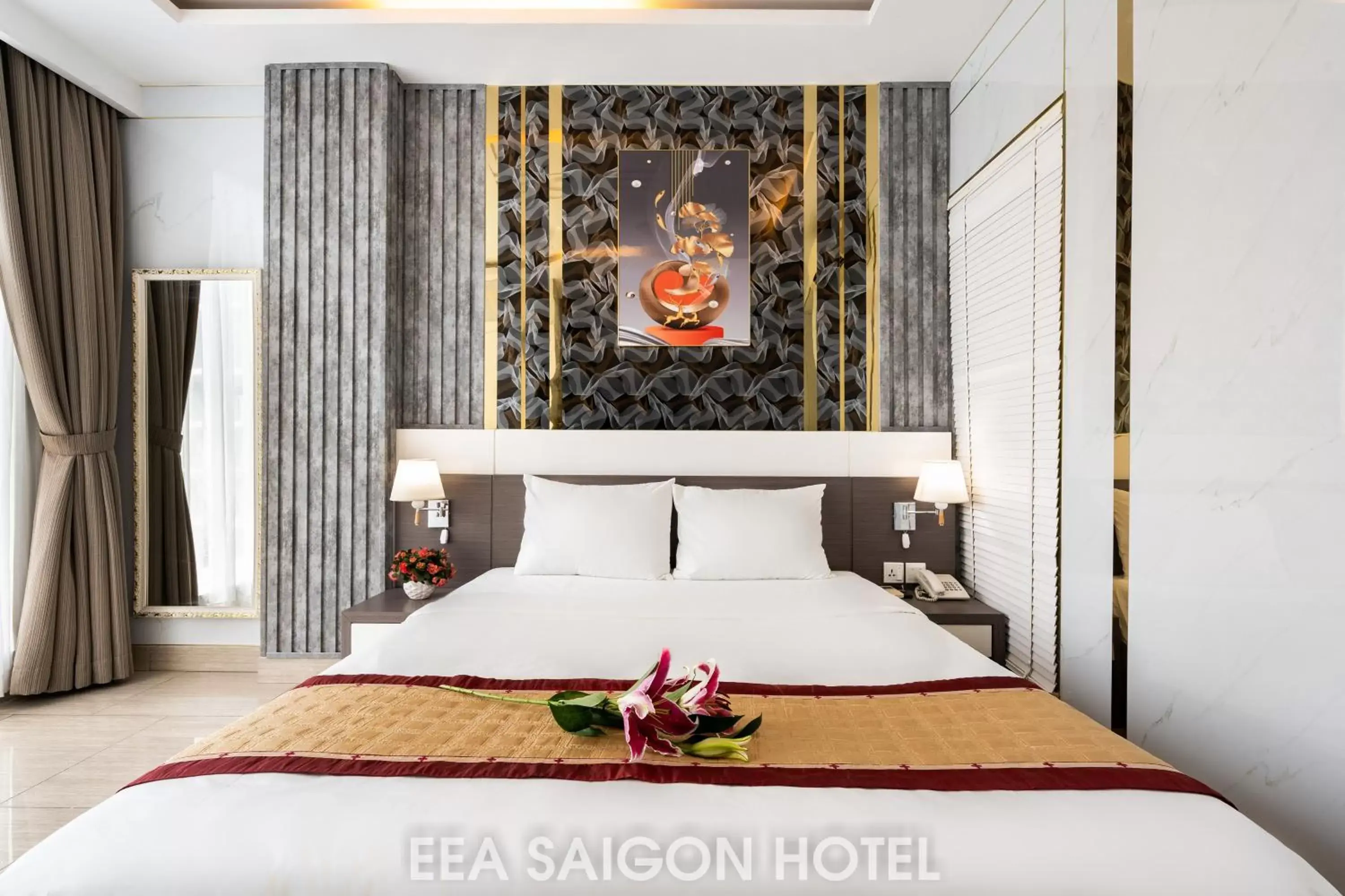 Bed in EEA Central Saigon Hotel