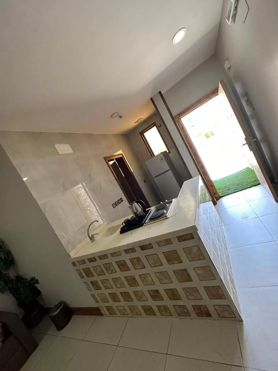 Kitchen or kitchenette in Leen Serviced Apartments-لين للشقق المخدومه