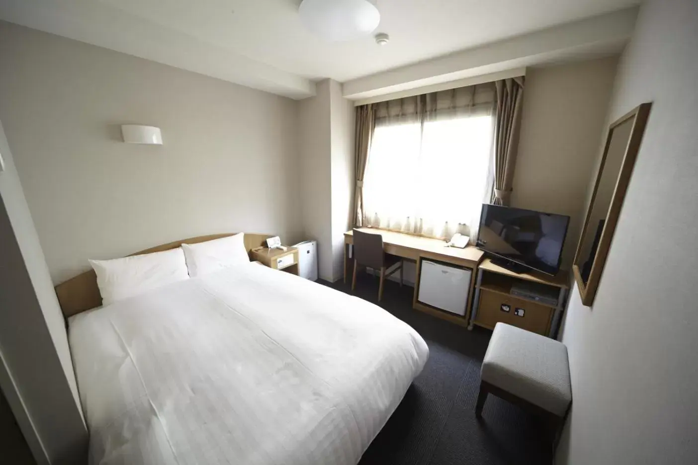 Photo of the whole room, TV/Entertainment Center in Dormy Inn Express Sendai Hirose Dori