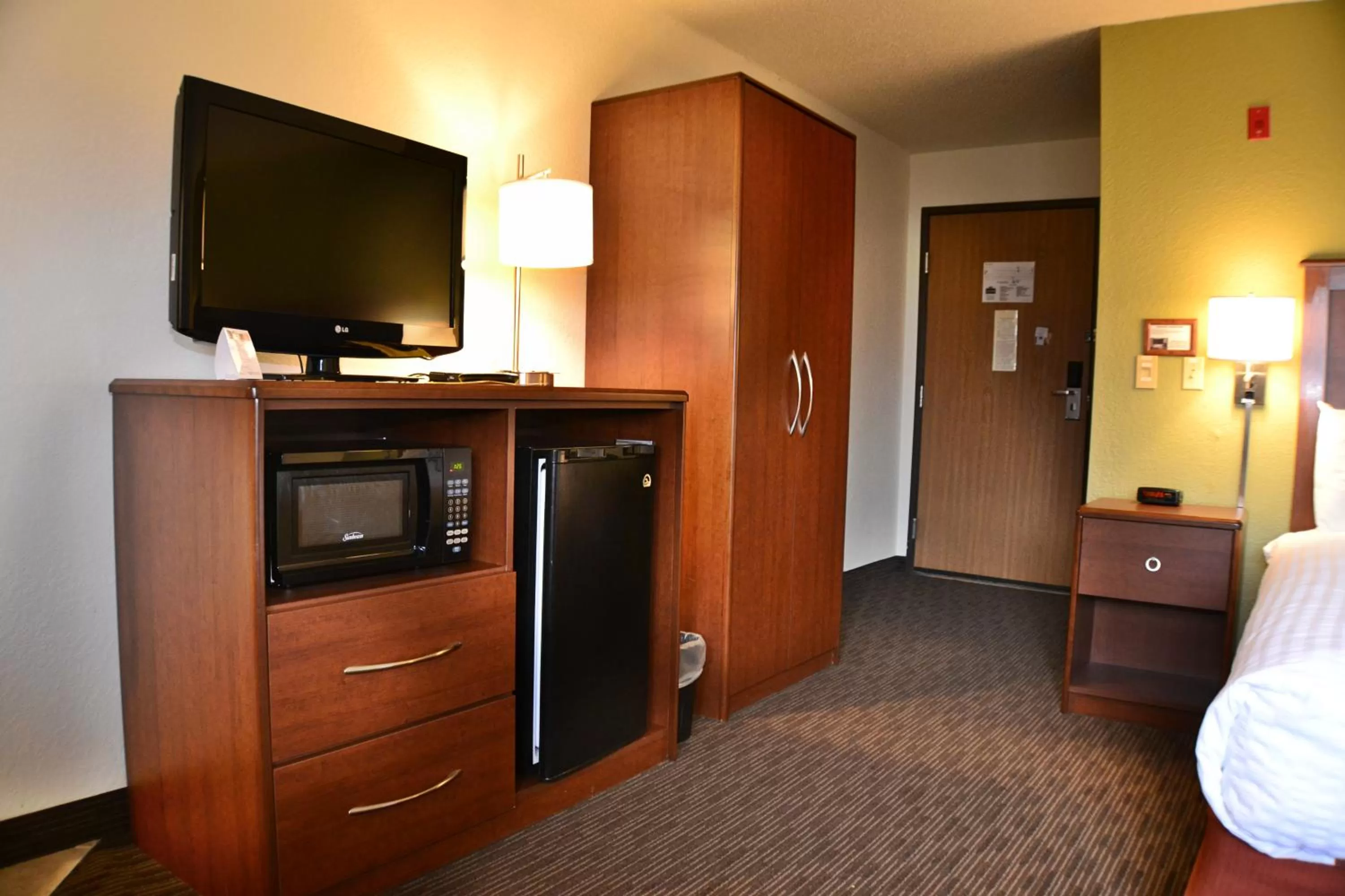 Decorative detail, Bed in AmericInn by Wyndham Calumet