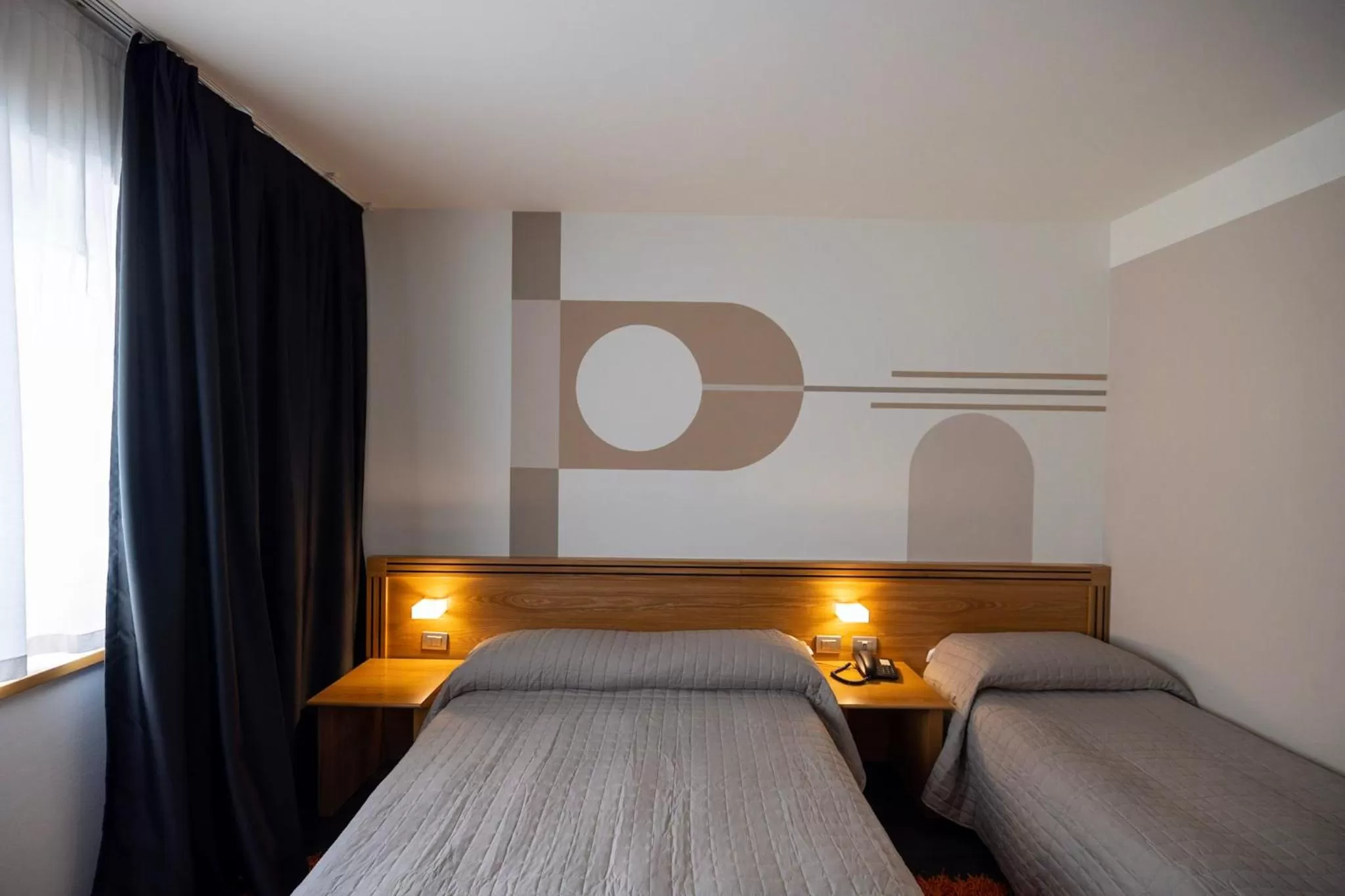 Bed in Hotel Europa Belluno