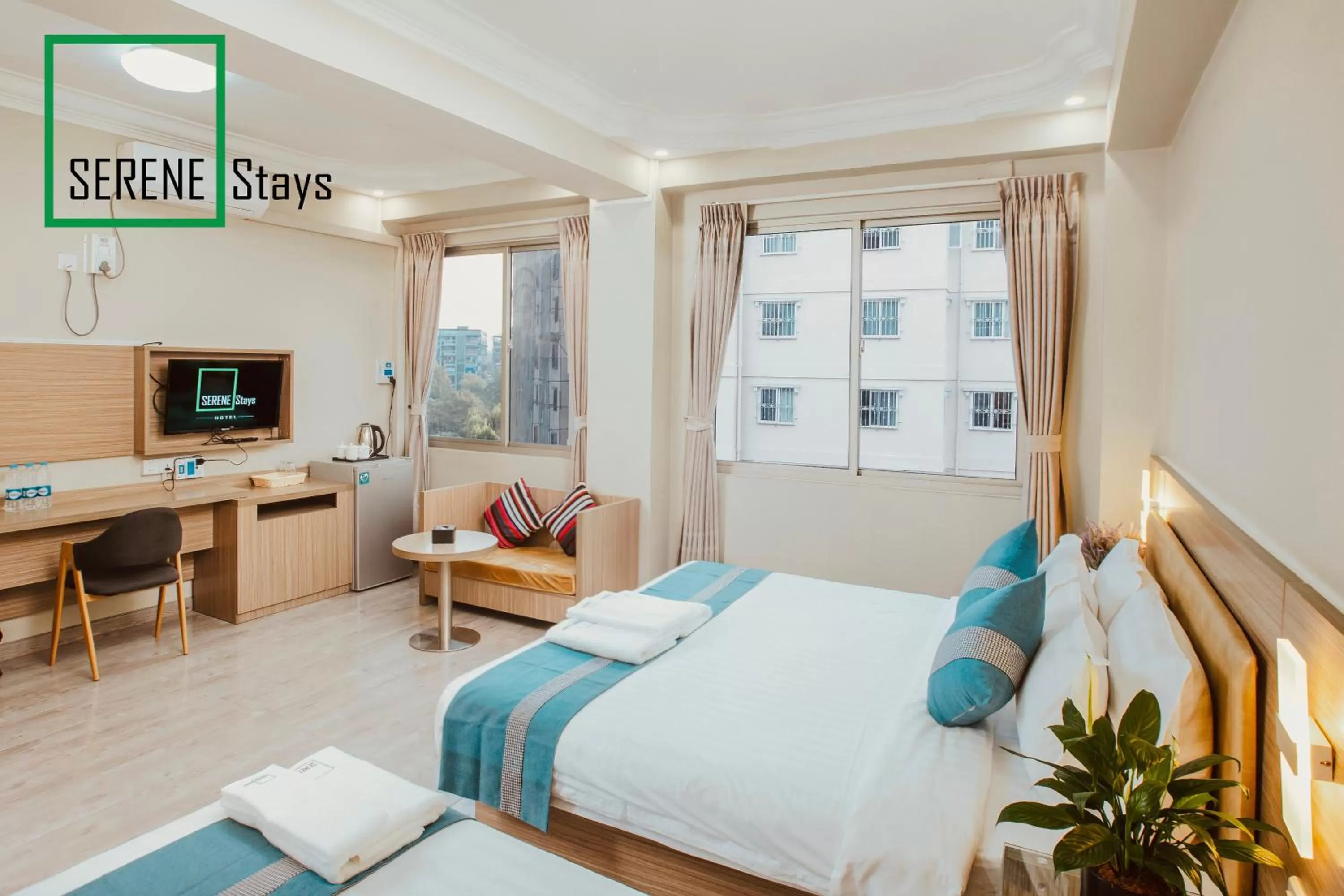 Photo of the whole room, Bed in SERENE Stays Hotel