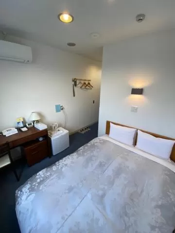 Bed in Hotel New Yutaka