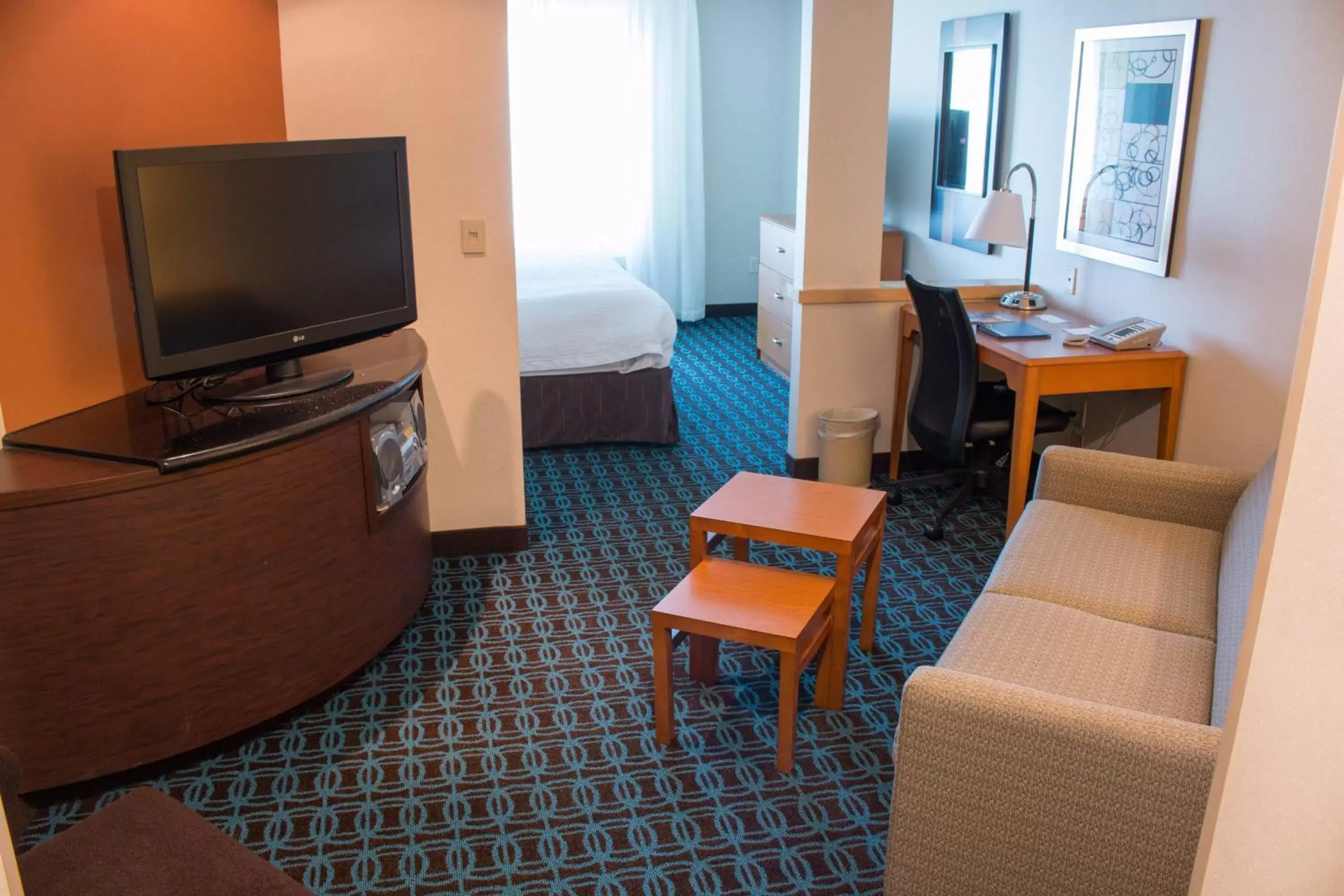 Photo of the whole room, TV/Entertainment Center in Fairfield Inn & Suites Oakland Hayward