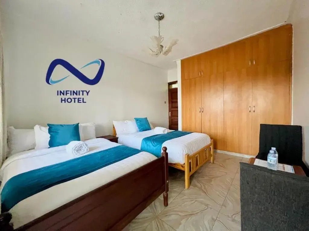 Bed in Infinity Hotel Kampala
